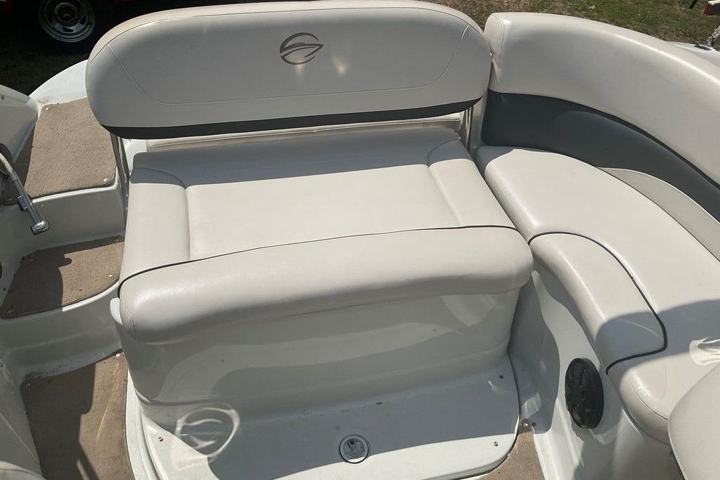 2015 Crownline 236 SC boat interior with white cushioned seating.