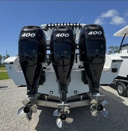 Three outboard motors on a 2023 Fountain 38 Tournament Edition boat.