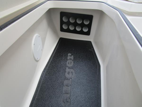 2024 Ranger 2360 Bay boat interior with rod holders and non-slip flooring.
