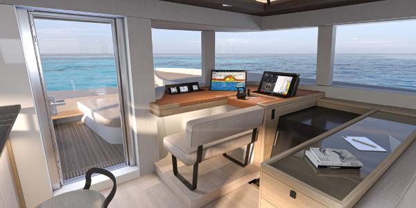 Luxurious Lagoon 83 yacht interior, featuring modern navigation equipment and ocean views, 2025 model.