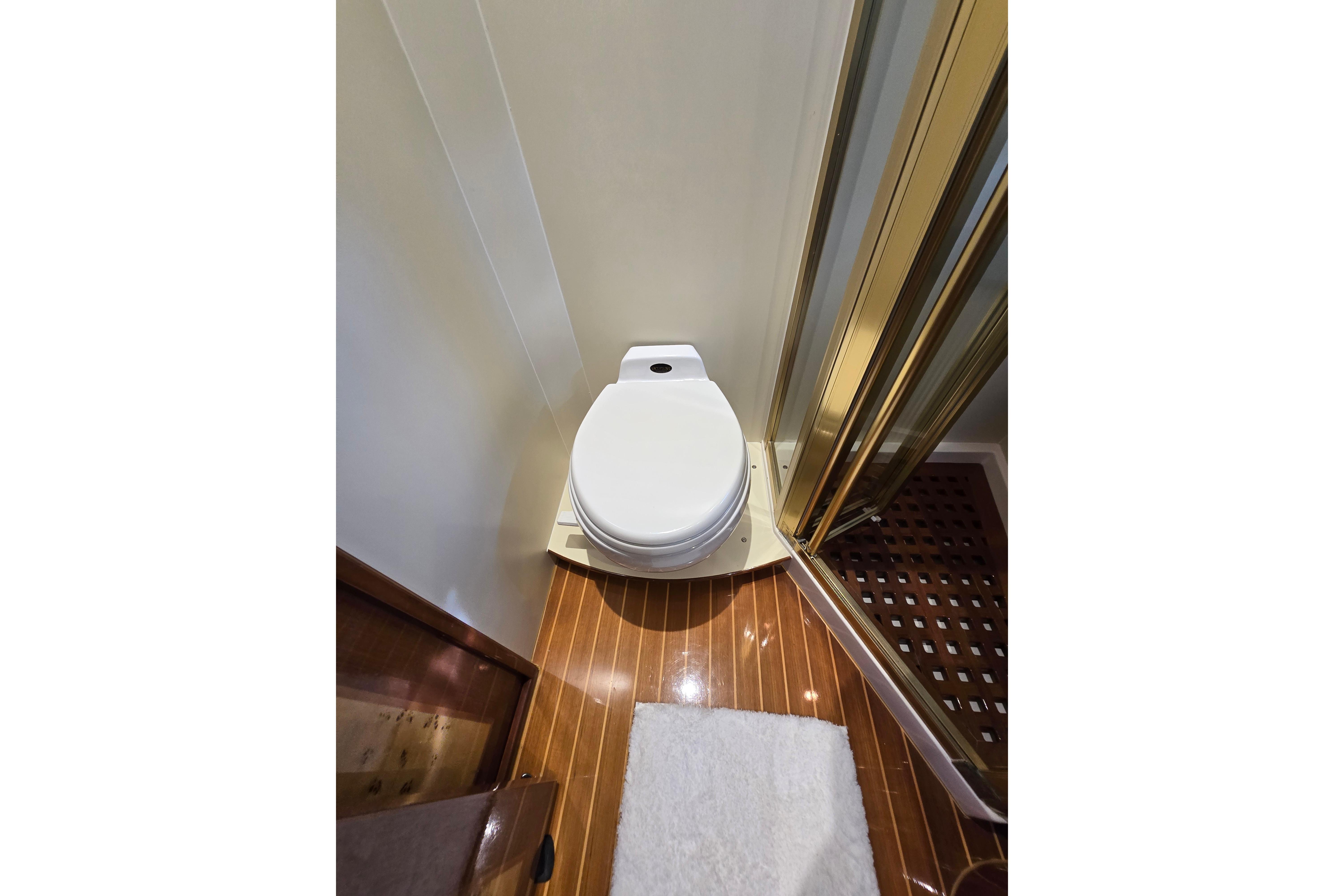 Luxury yacht bathroom with toilet and shower, Grand Harbour 58, 2004 model.