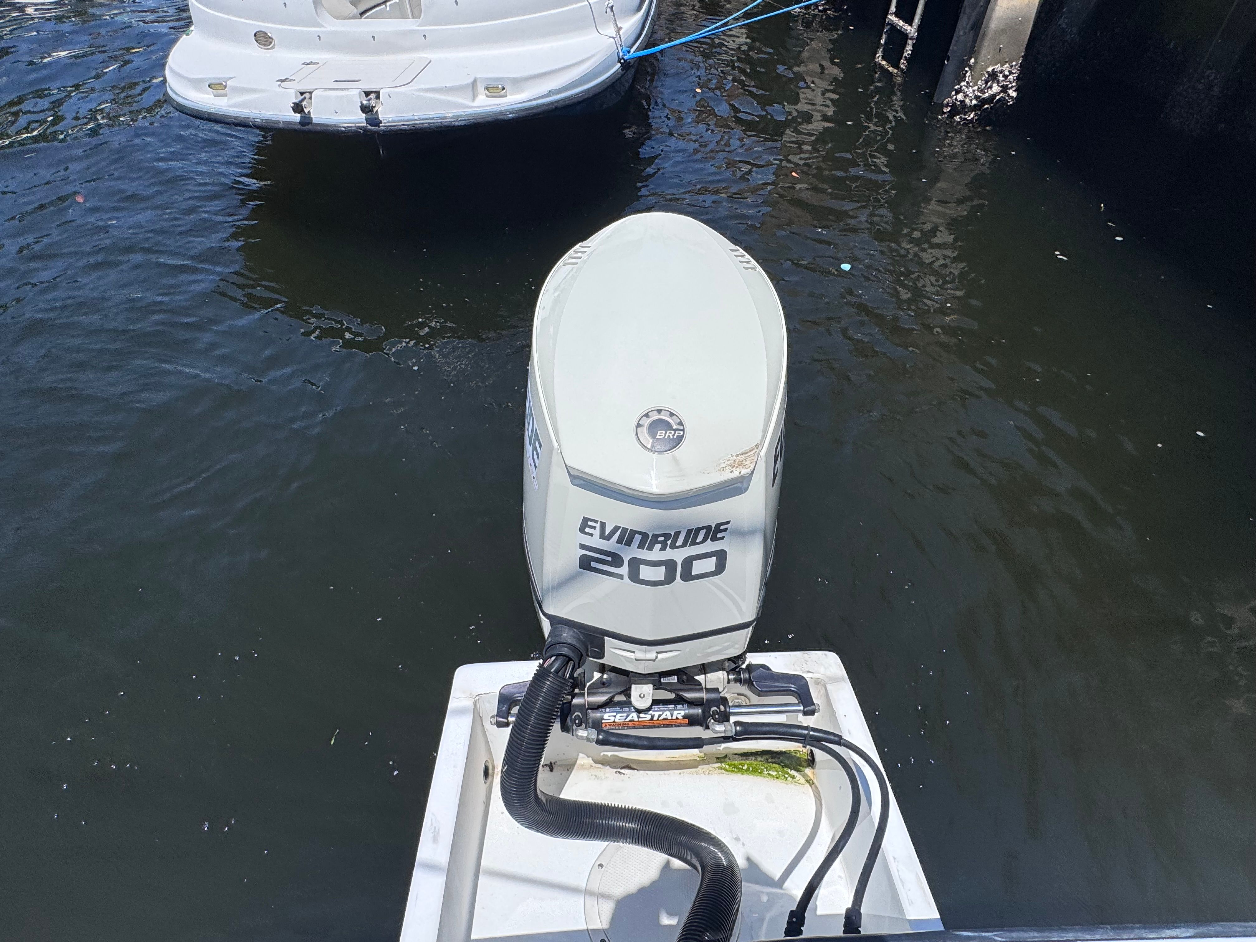 Evinrude 200 outboard motor on a 1998 Dusky 20.3 boat.