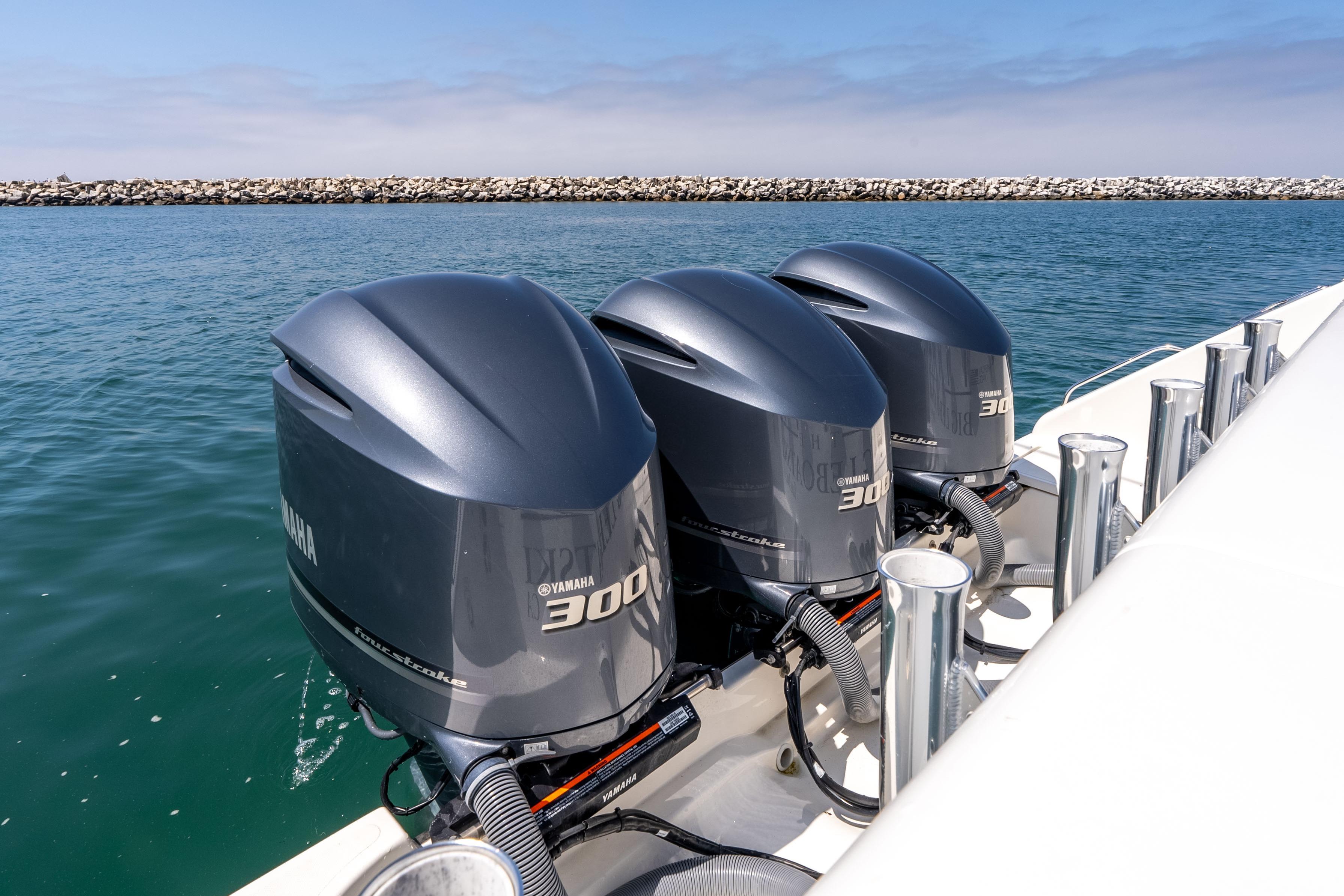 Triple Yamaha 300 outboard engines on a 2022 Pursuit OS 385 Offshore boat.