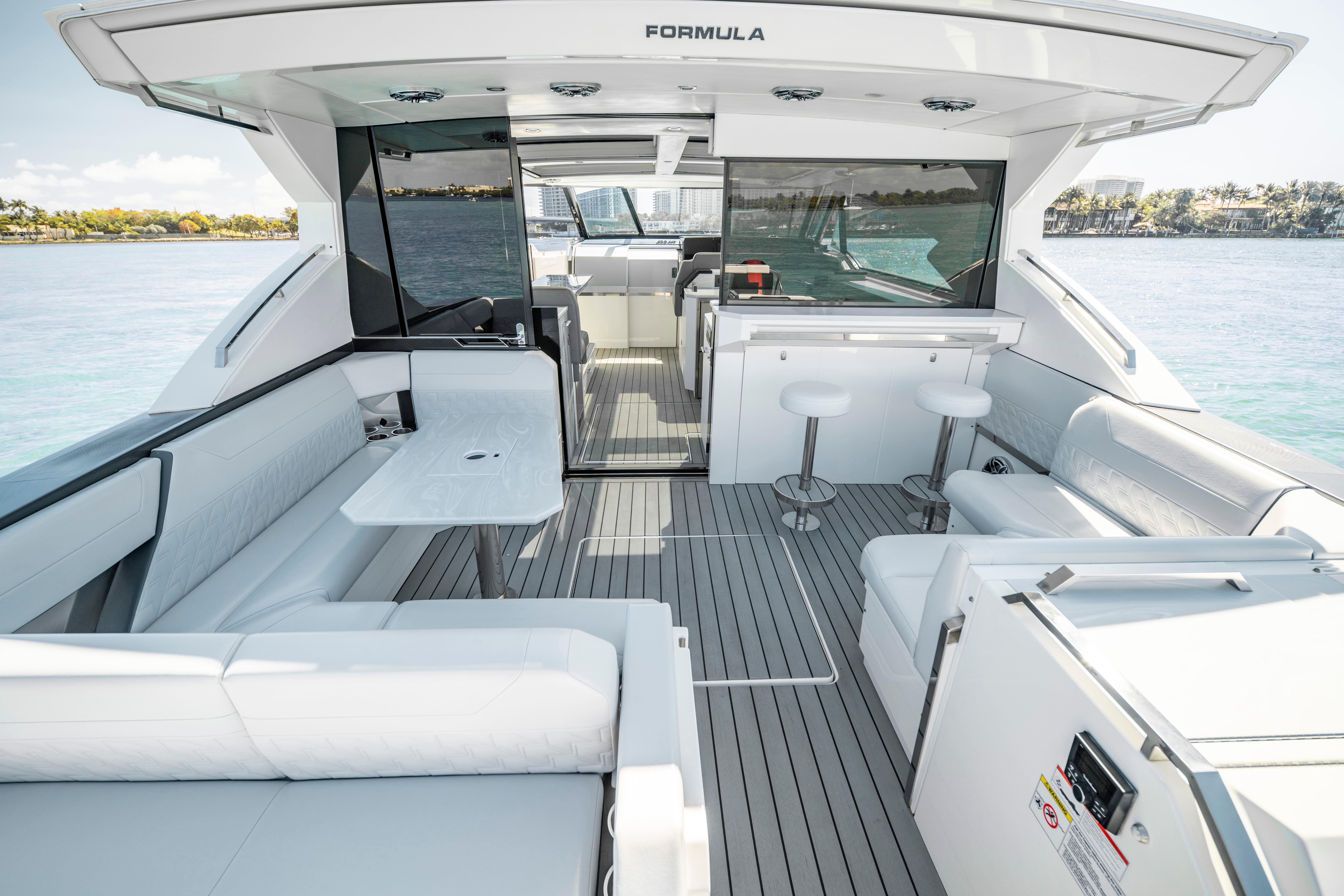 2022 Formula 500 Super Sport Crossover luxury yacht interior with seating and ocean view.