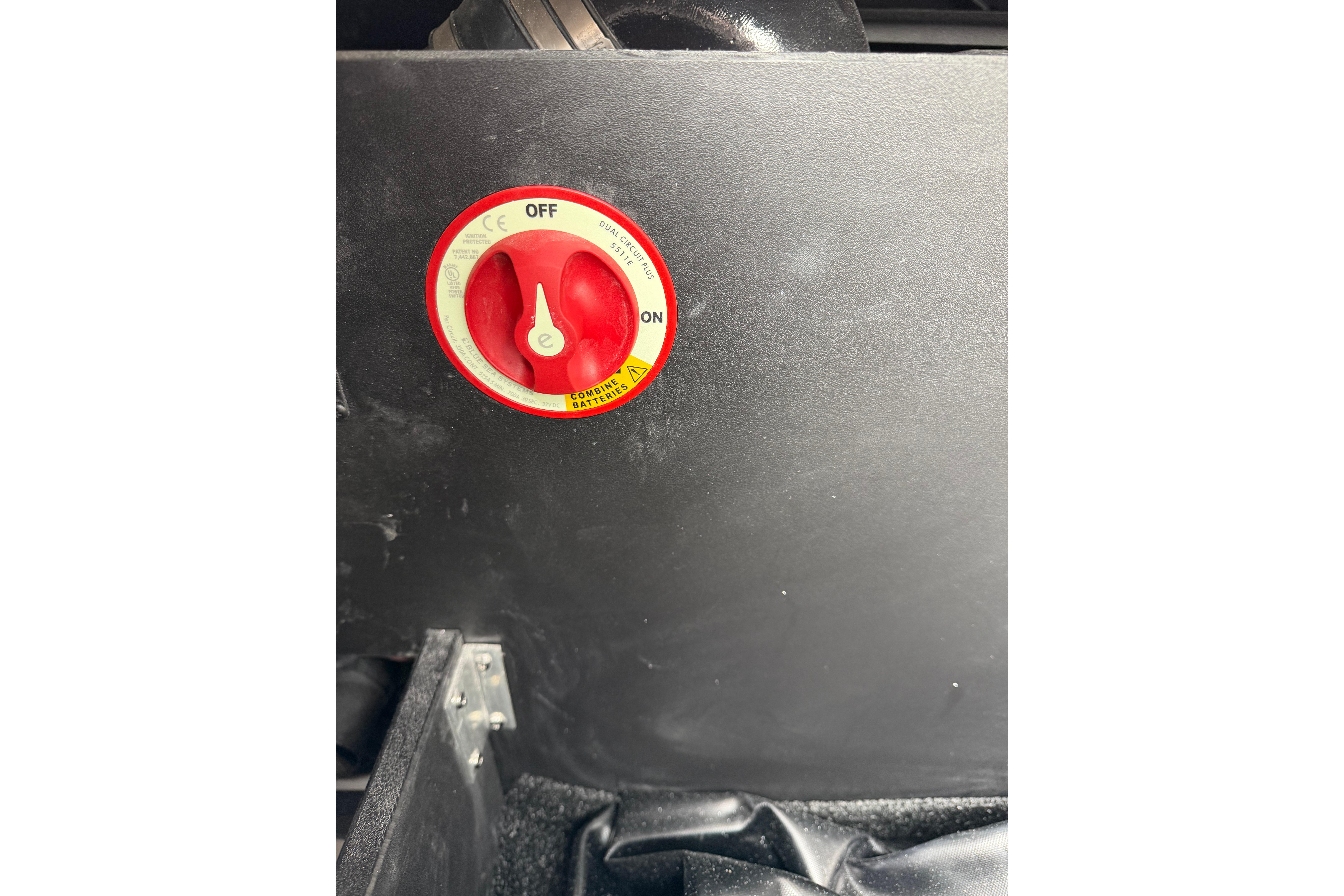 Red battery switch on 2026 Regal LS2 Surf boat panel.