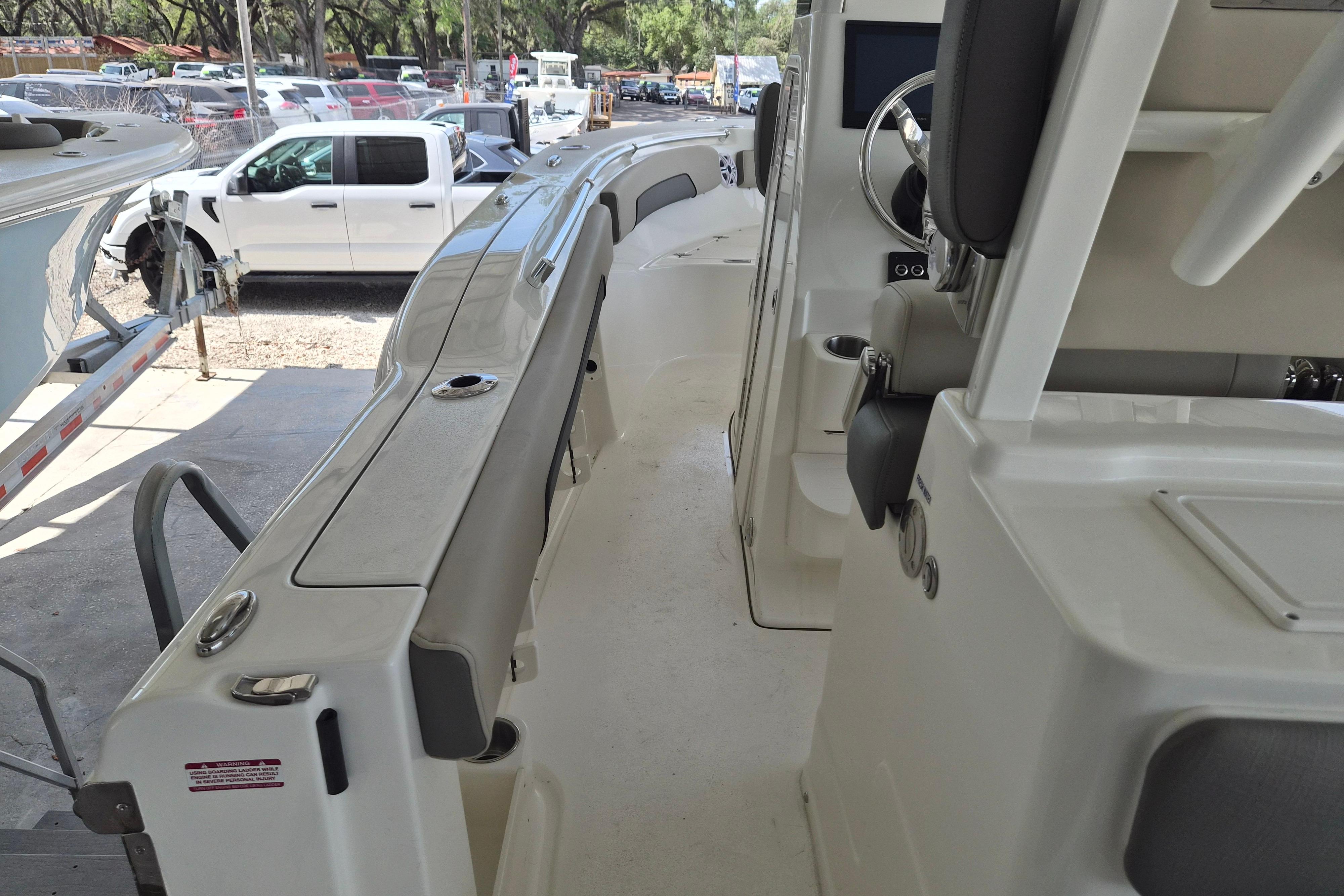 2026 Key West 260 Center Console boat interior with seating and steering wheel.