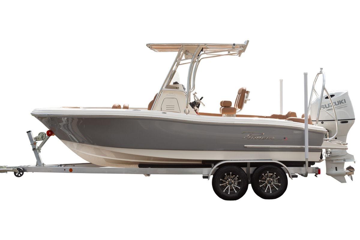 Manufacturer Provided Image: 2025 Pioneer 202 Islander boat on trailer, featuring sleek design and Suzuki outboard motor.