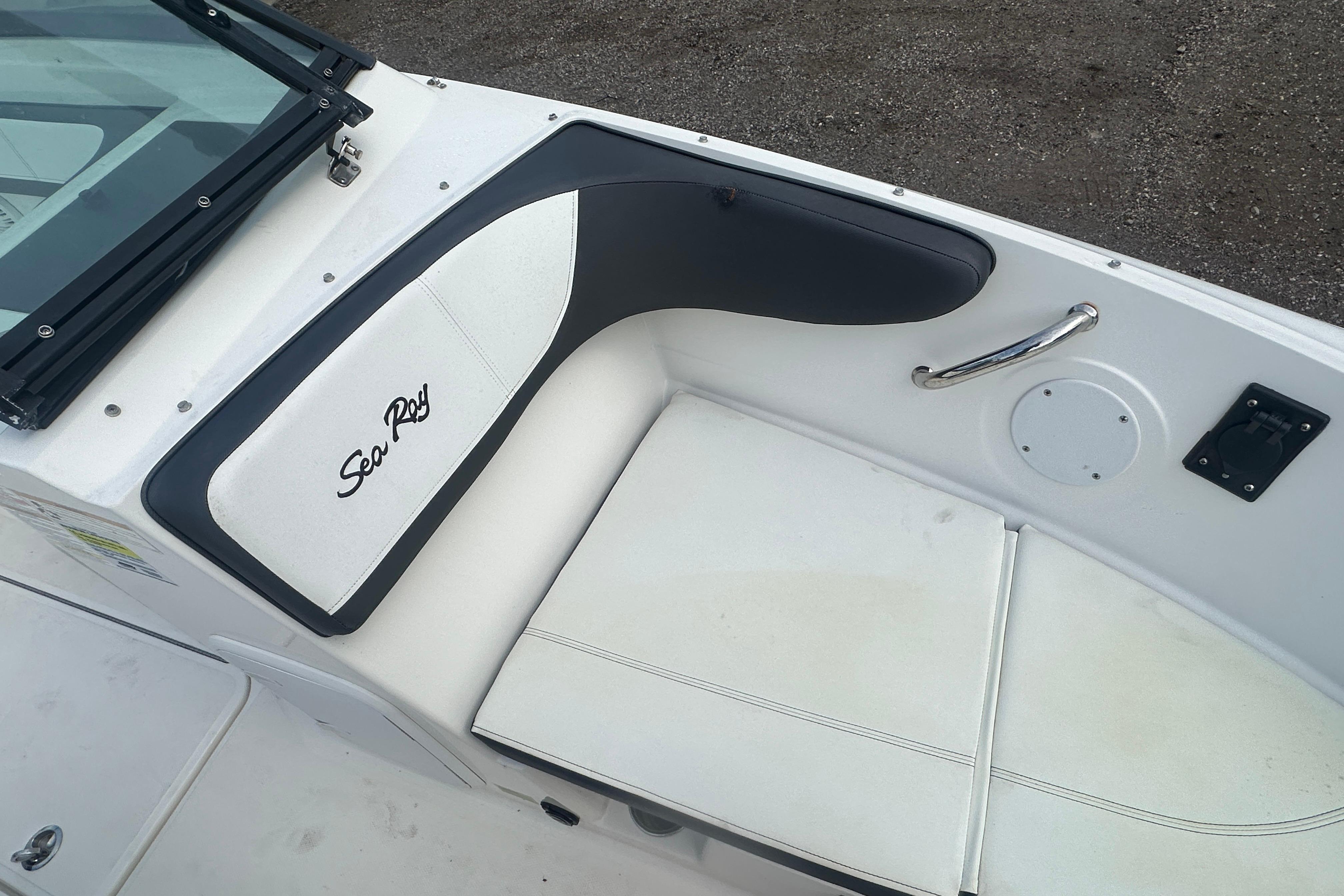 2017 Sea Ray SPX 190 Outboard boat interior with white seating and logo.