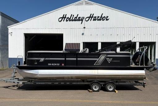 2023 Viaggio Lago 22U Tri Toon Mercury 150 boat on trailer at Holiday Harbor.