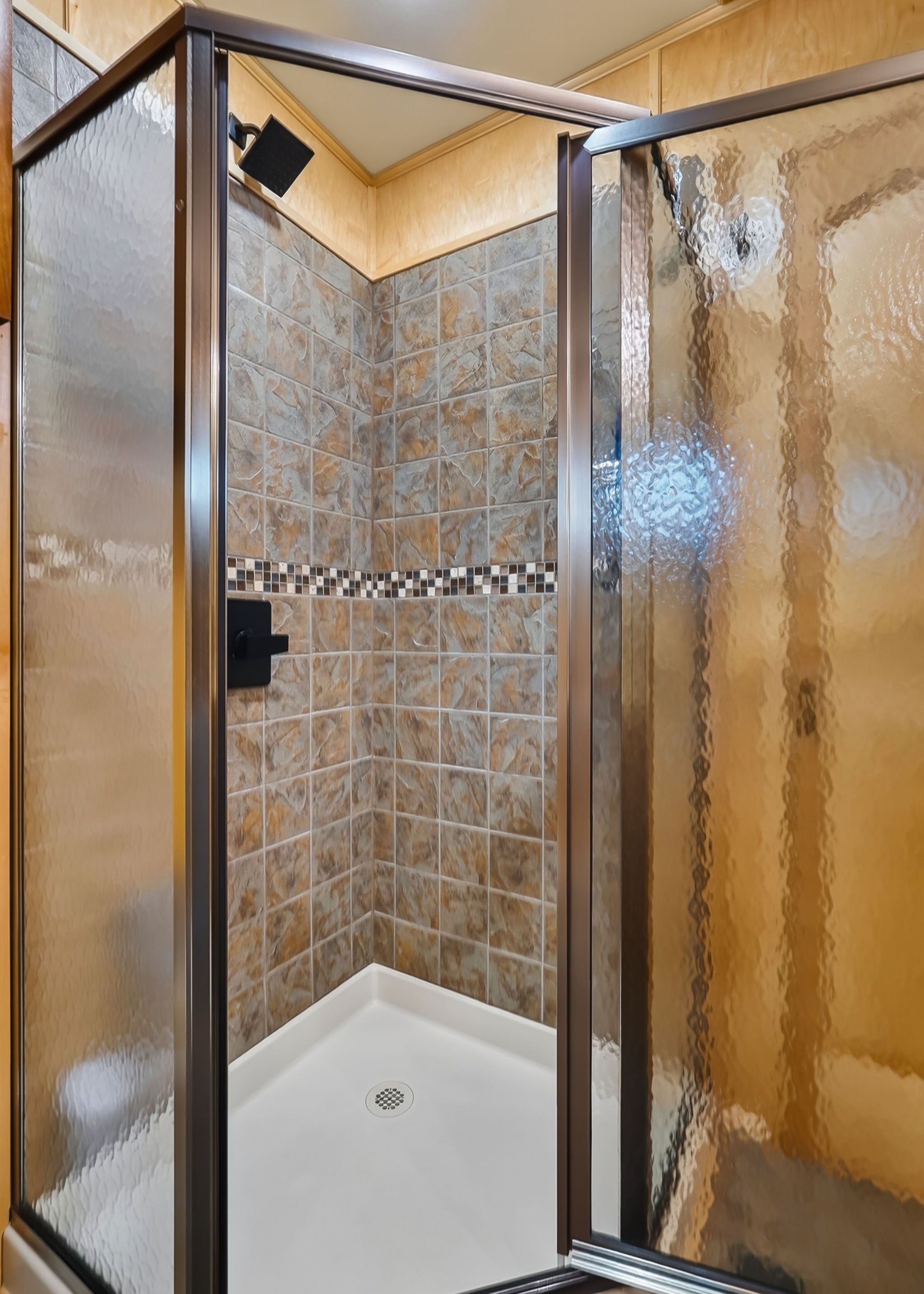 Tiled shower in a 2010 Houseboat Throughbred.