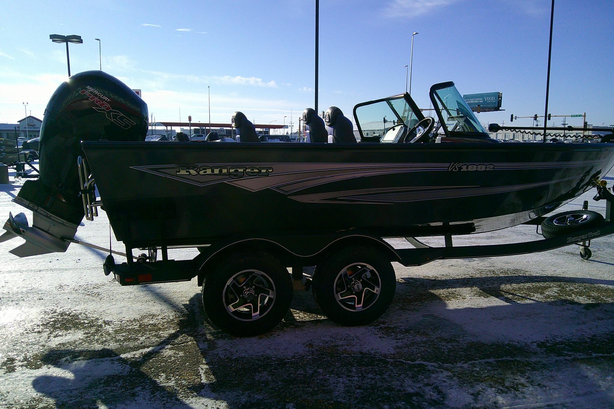 2026 Ranger VS1882SC Reata boat on trailer, parked outdoors in a snowy area.