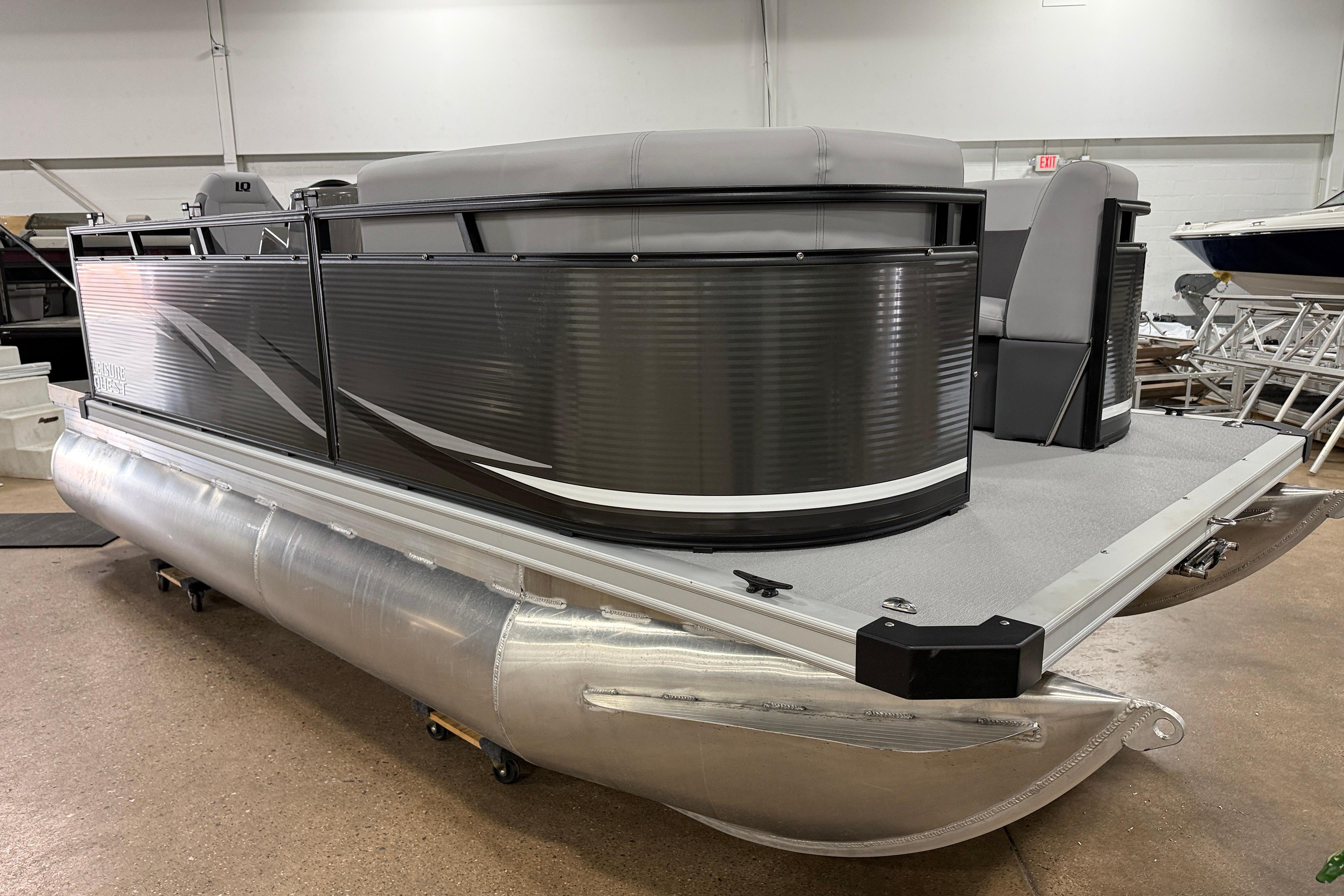 2026 Angler Quest 7515 Leisure Quest Cruise pontoon boat in showroom.