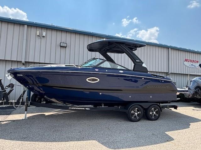2026 Chaparral SSX 6 boat on trailer, parked outdoors under clear sky.