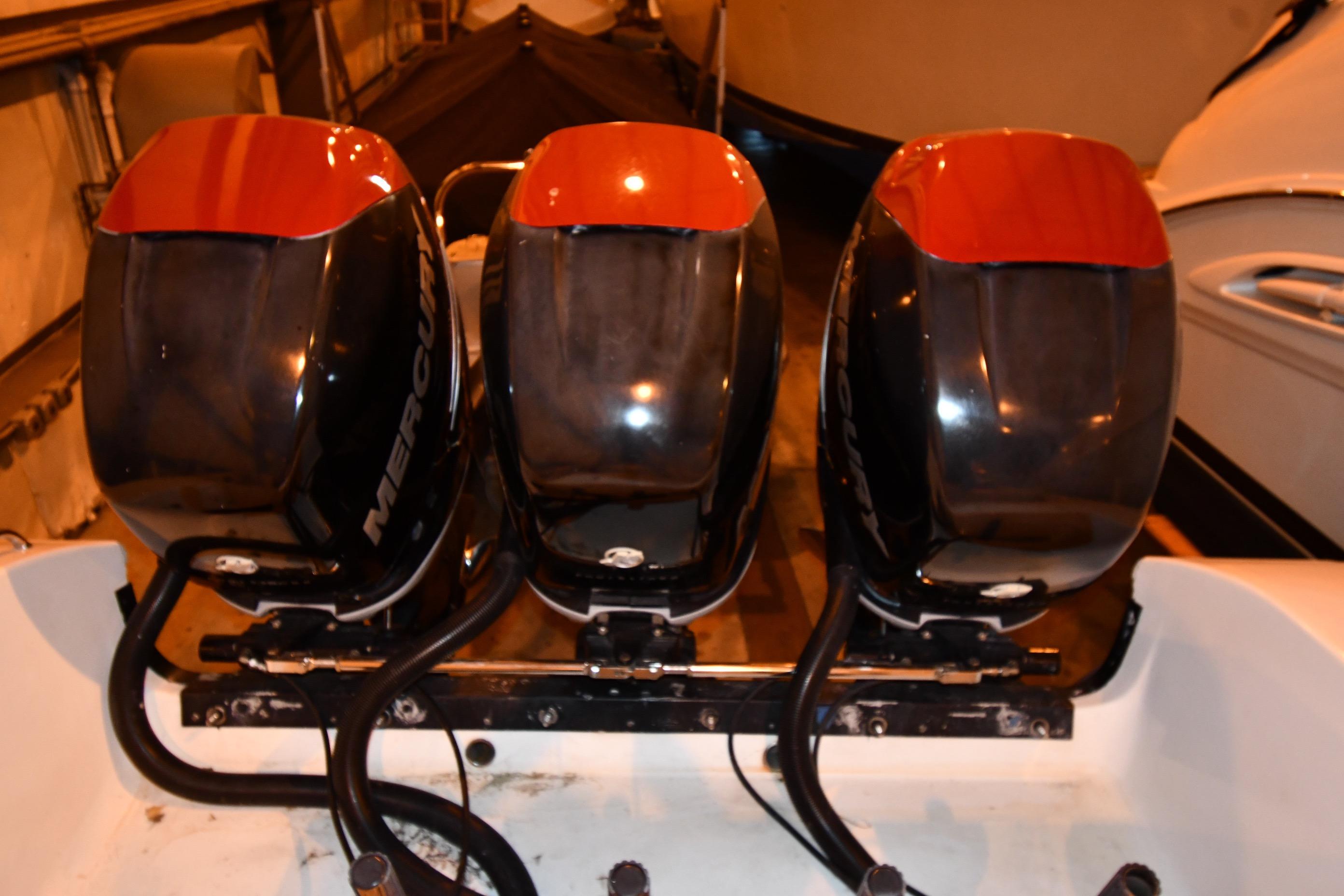 Triple Mercury outboard engines on a 2001 Fountain 38 Center Console boat.