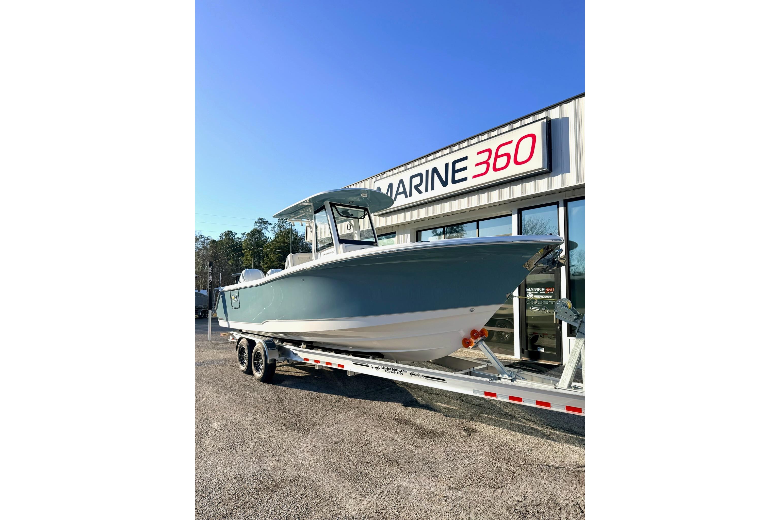 2026 Sea Hunt Ultra 275 Coffin Box boat on trailer at Marine 360 dealership.