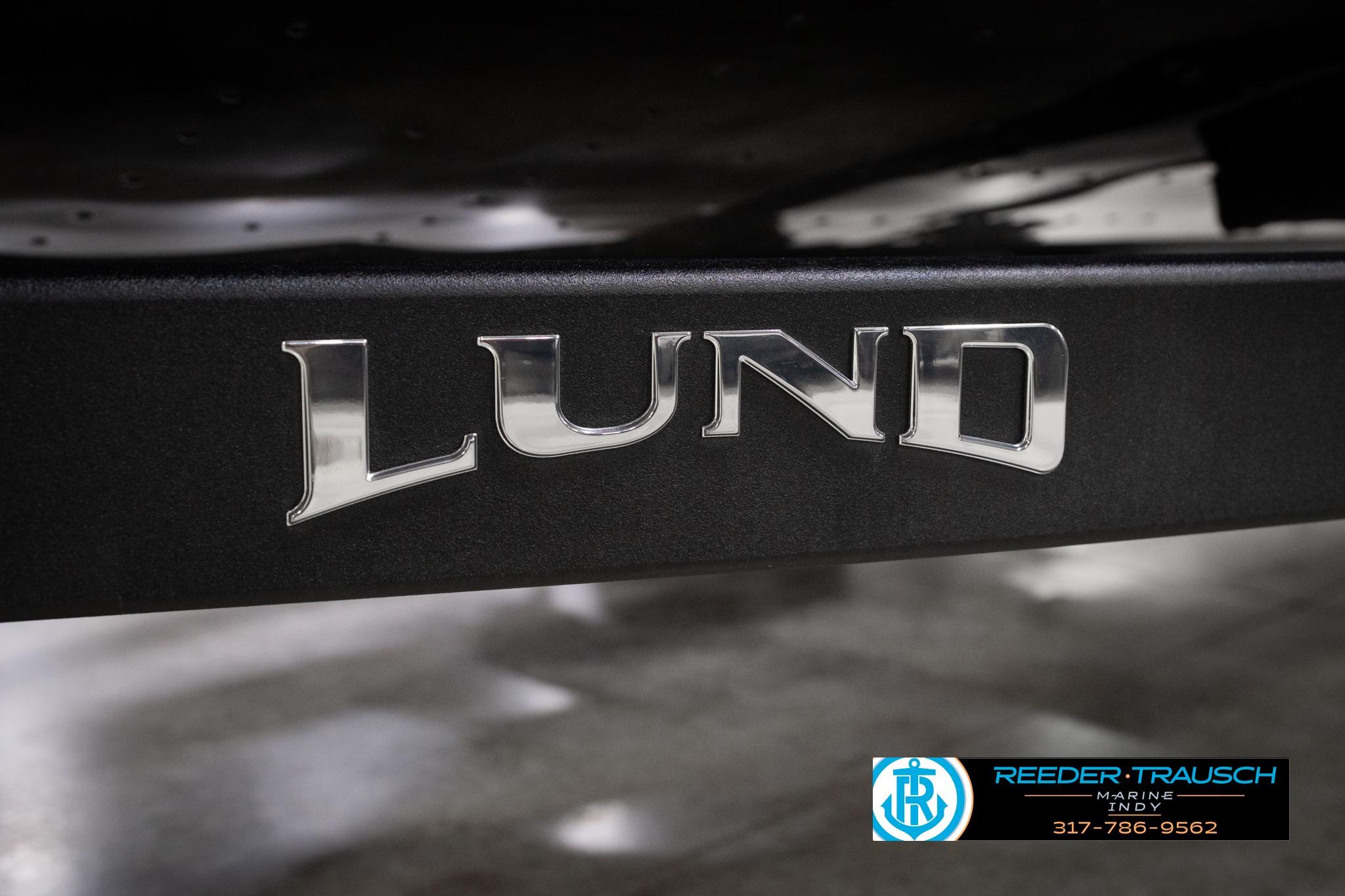 Chrome "Lund" logo on 2026 Lund 1775 Impact XS SS boat trailer.