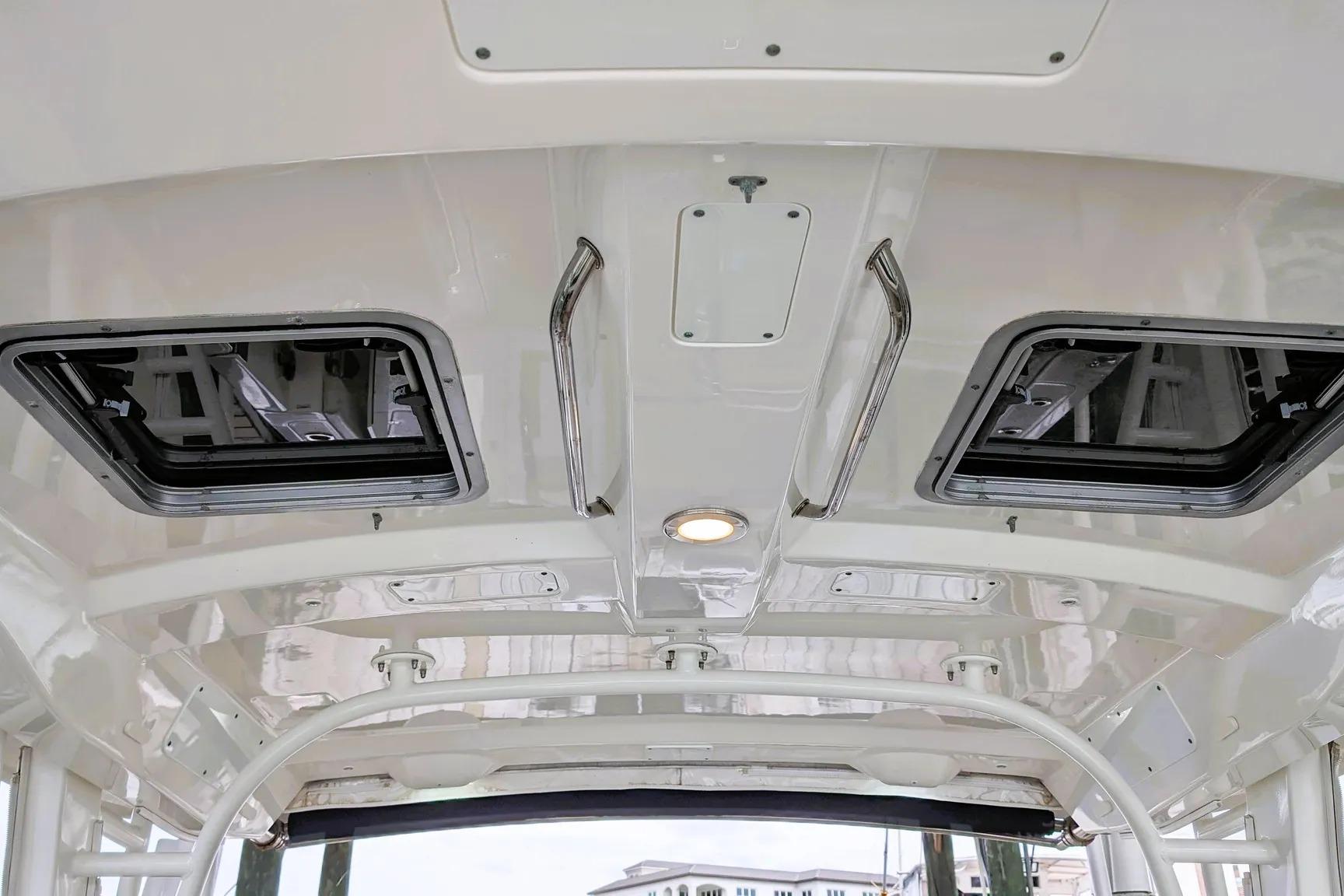Interior view of 2017 Boston Whaler 320 Vantage boat ceiling with hatches.