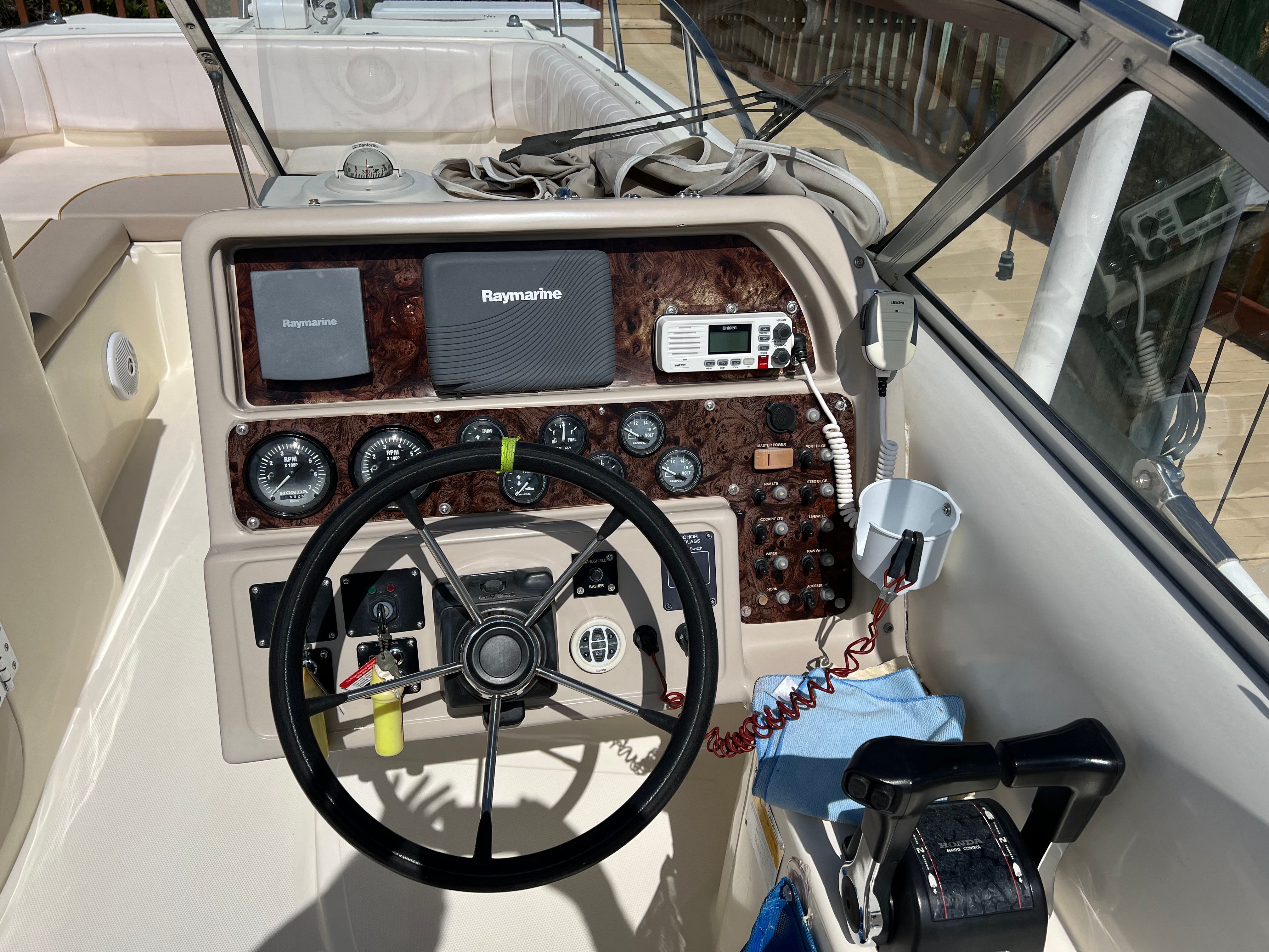 Helm console of a 2002 World Cat 246 DC boat.