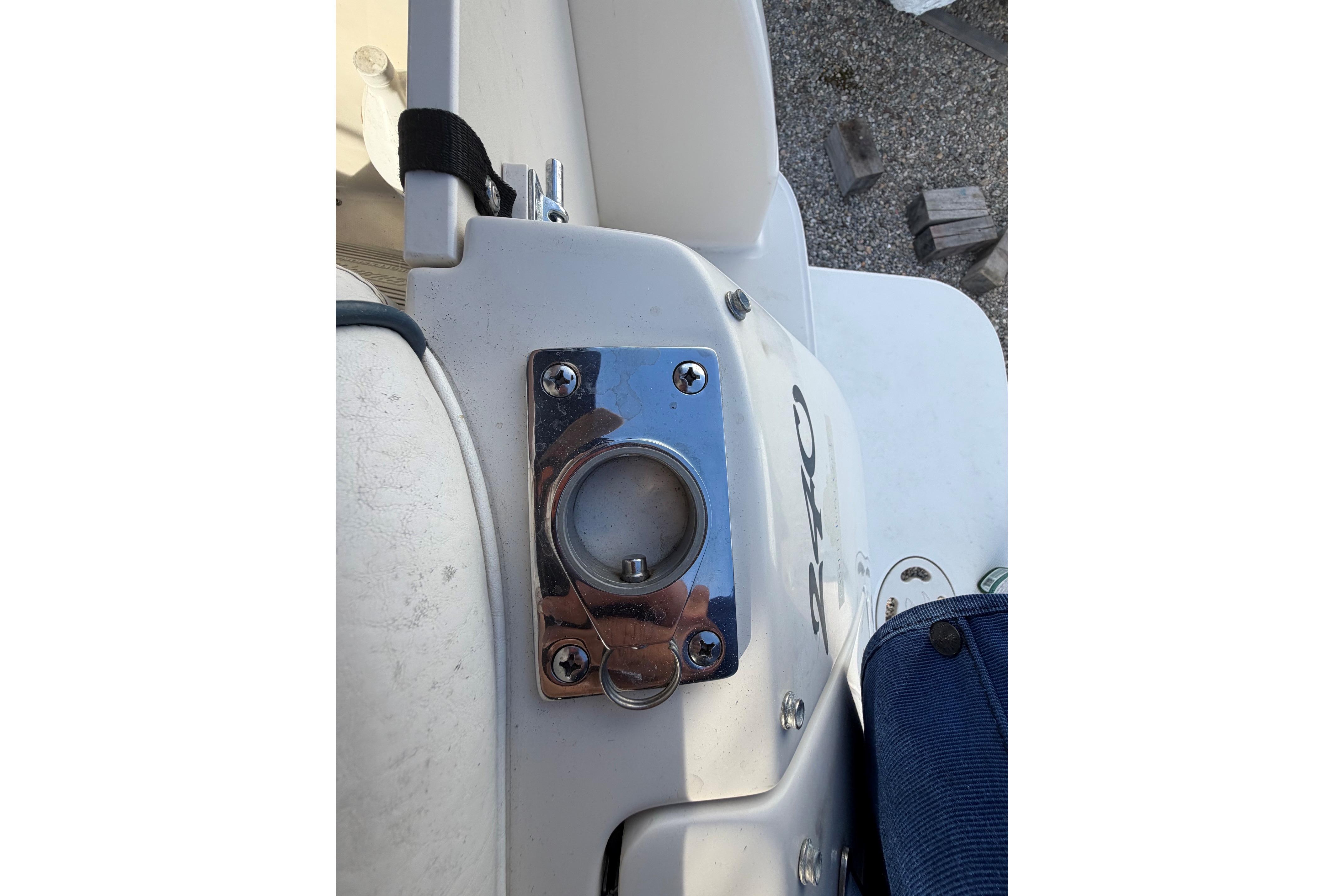 Close-up of a 2000 Sea Ray 240 Sundancer boat's deck hardware.