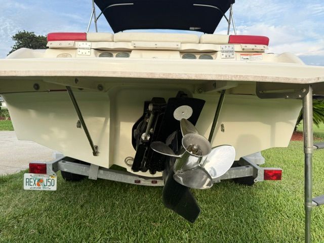 Rear view of a 2012 Bayliner 184 SF boat on a trailer.