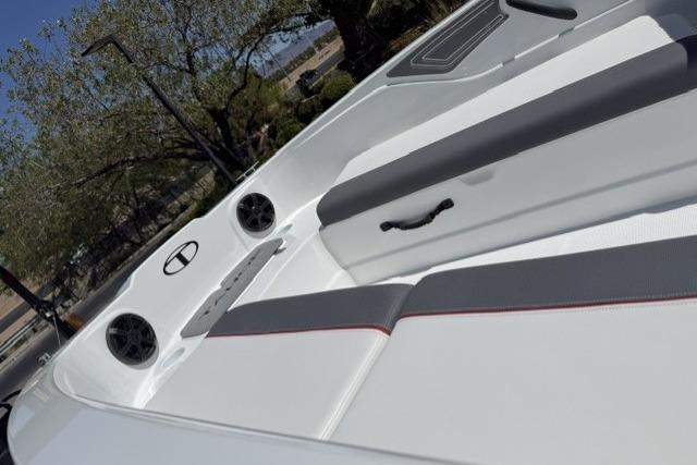 2026 Tahoe T21 boat interior with sleek seating and built-in speakers.