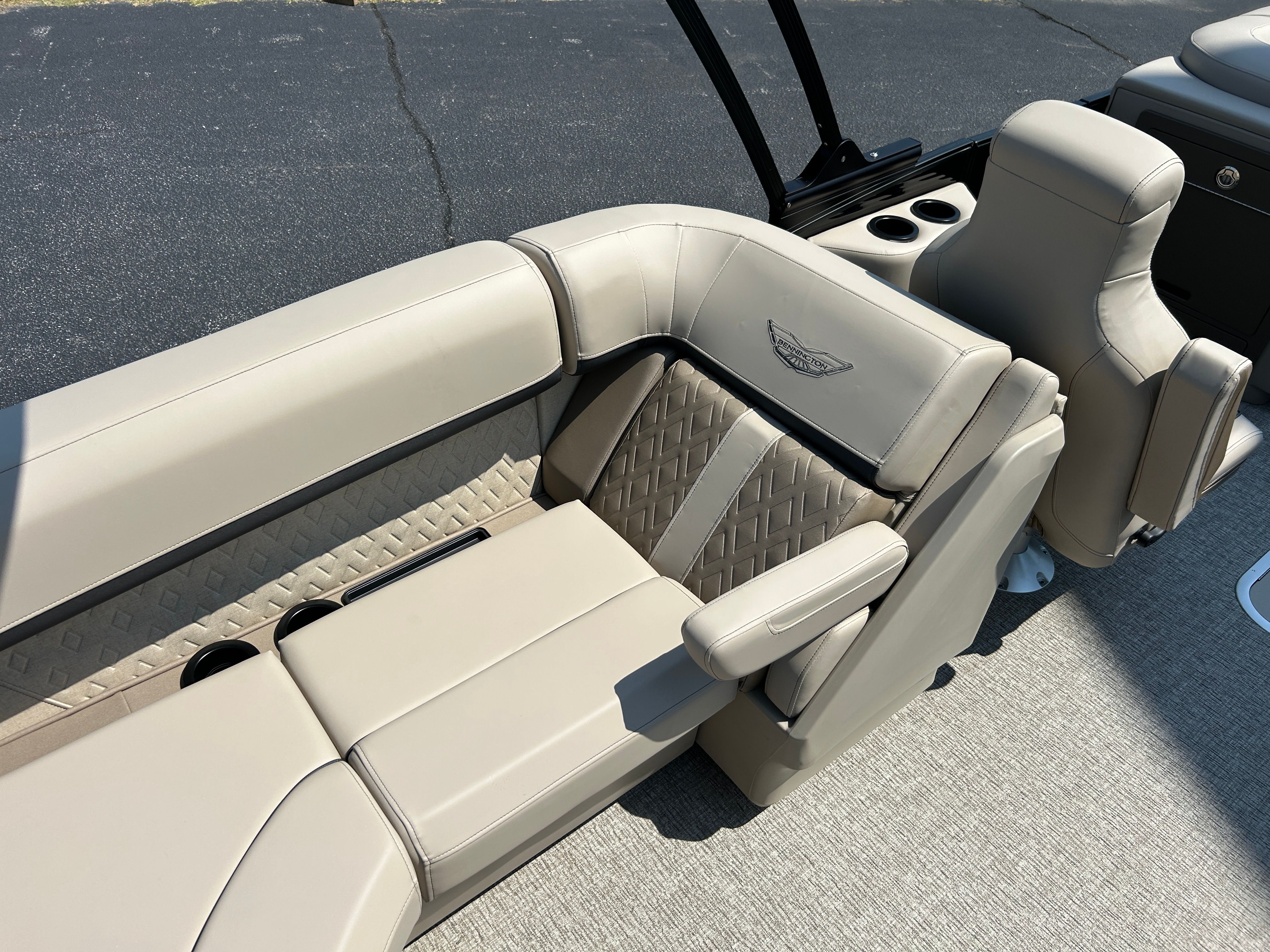 The image shows the luxurious seating of a 2026 Bennington 22 MFB boat.