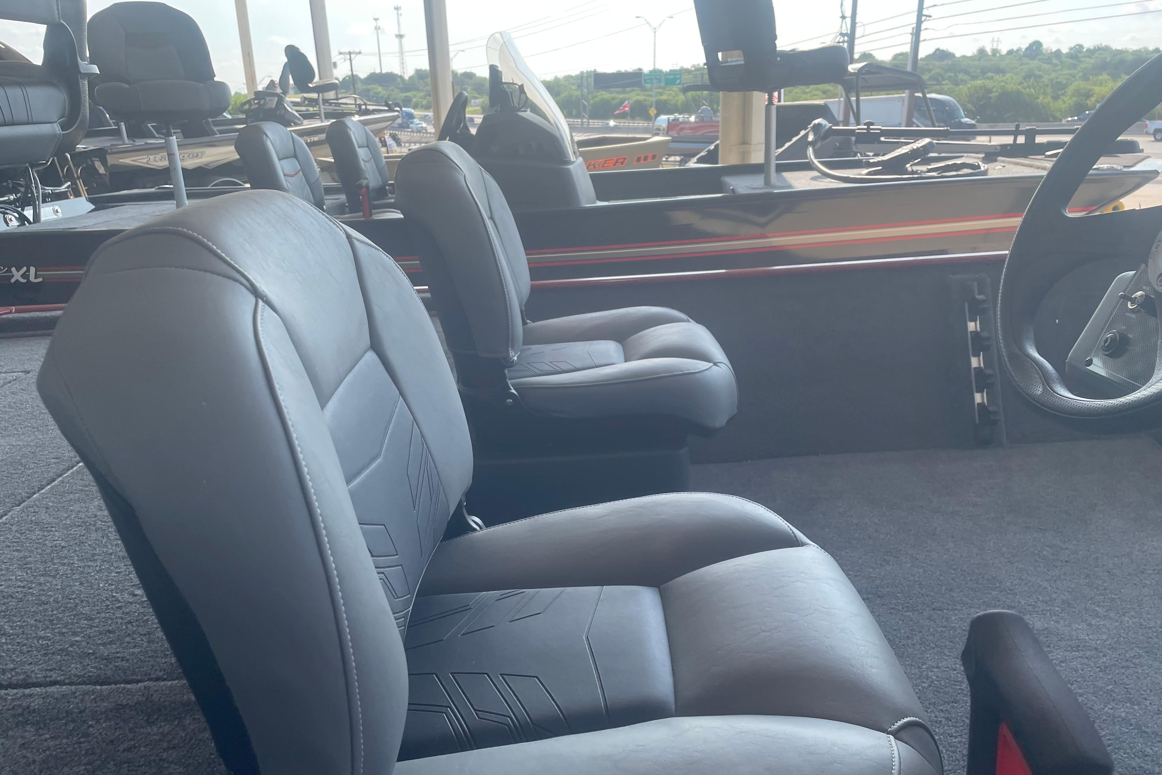 Interior of 2026 Tracker Bass Tracker Classic XL boat with comfortable seating.