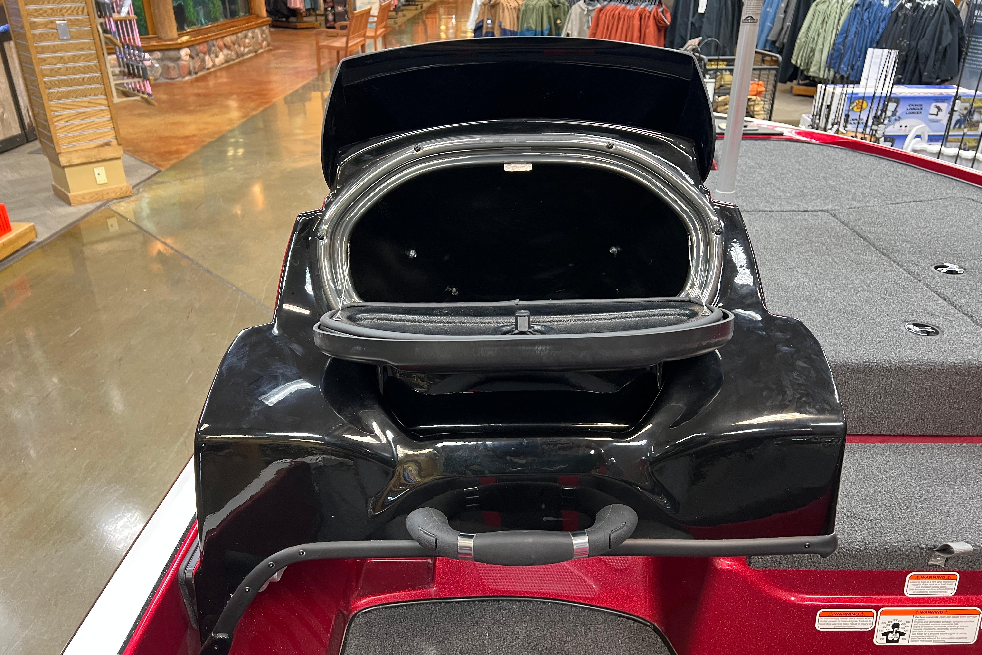 Open storage compartment on a 2026 Nitro Z17 boat, showcasing interior space.