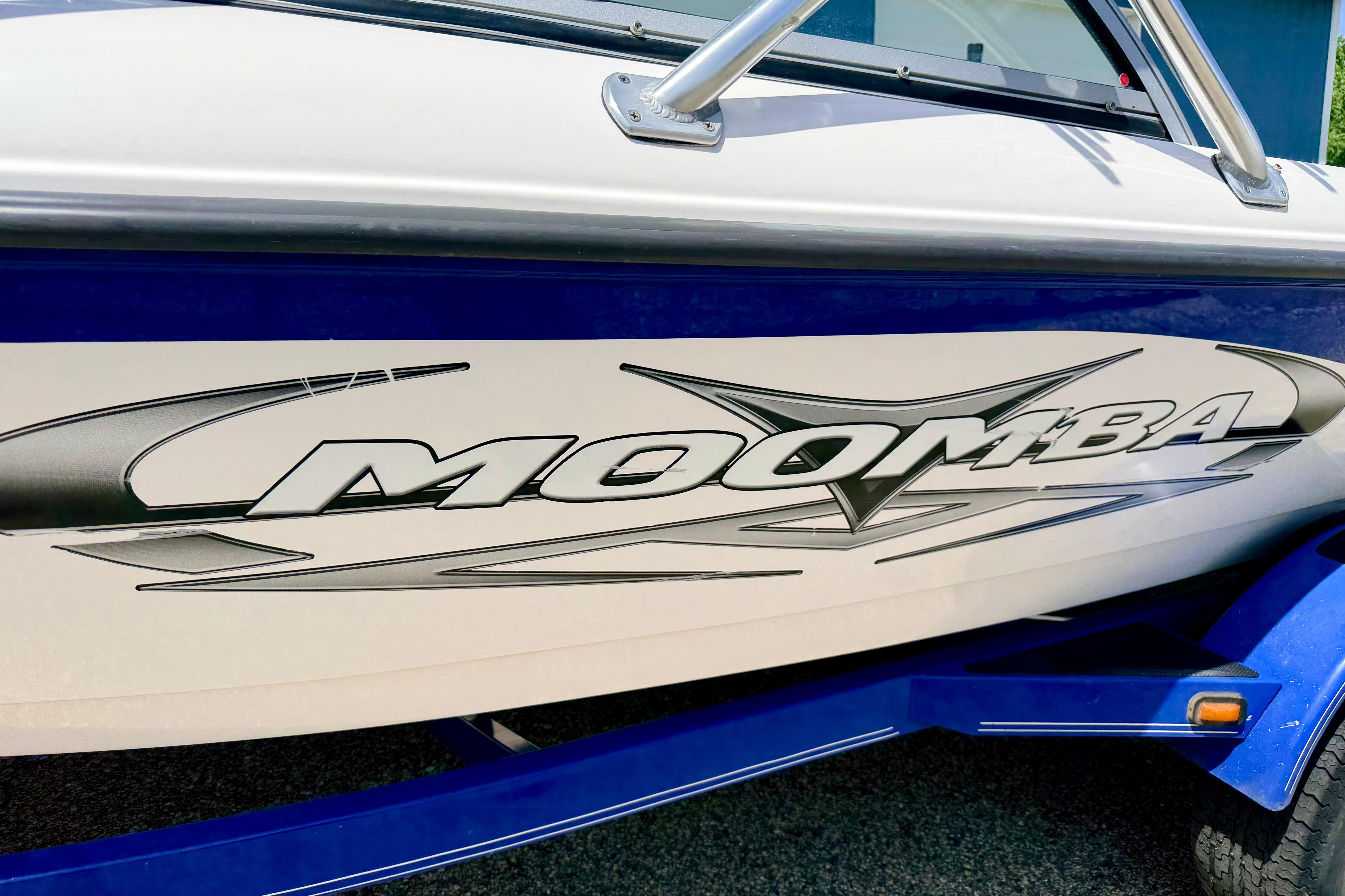 2008 Moomba Outback V boat with bold logo and sleek design.