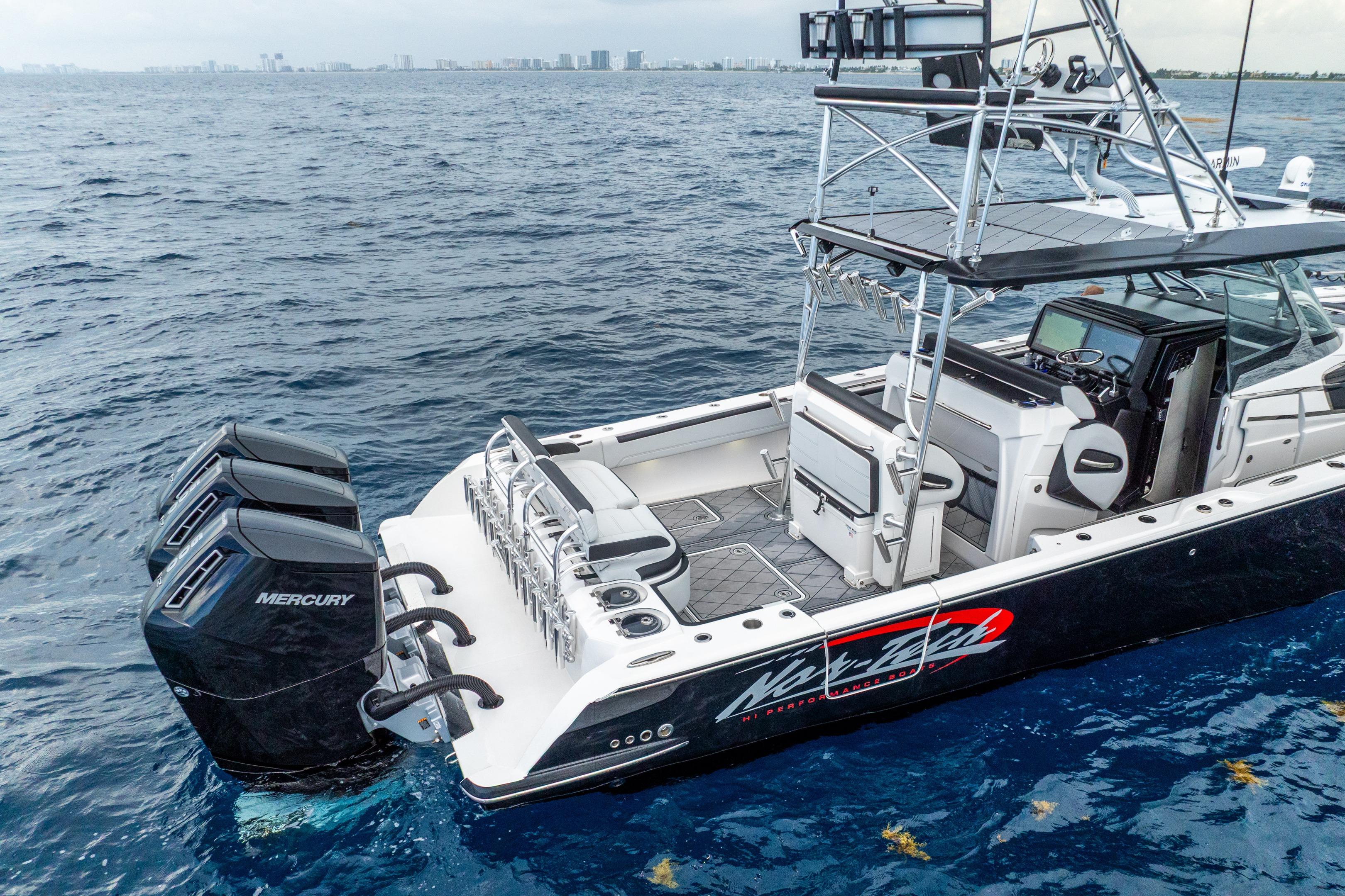 2024 Nor-Tech 452 Super Fish boat with Mercury engines on open water.