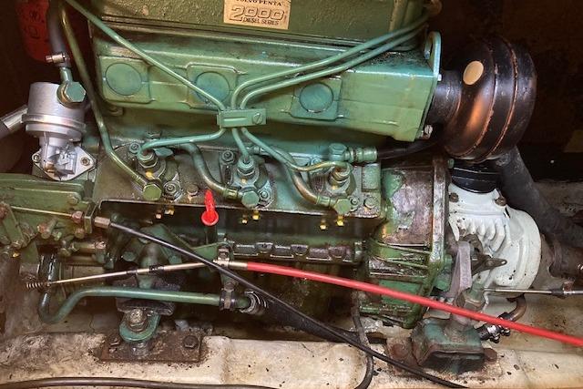 Engine of 1988 Westerly Corsair 36 sailboat, showcasing mechanical components and wiring.