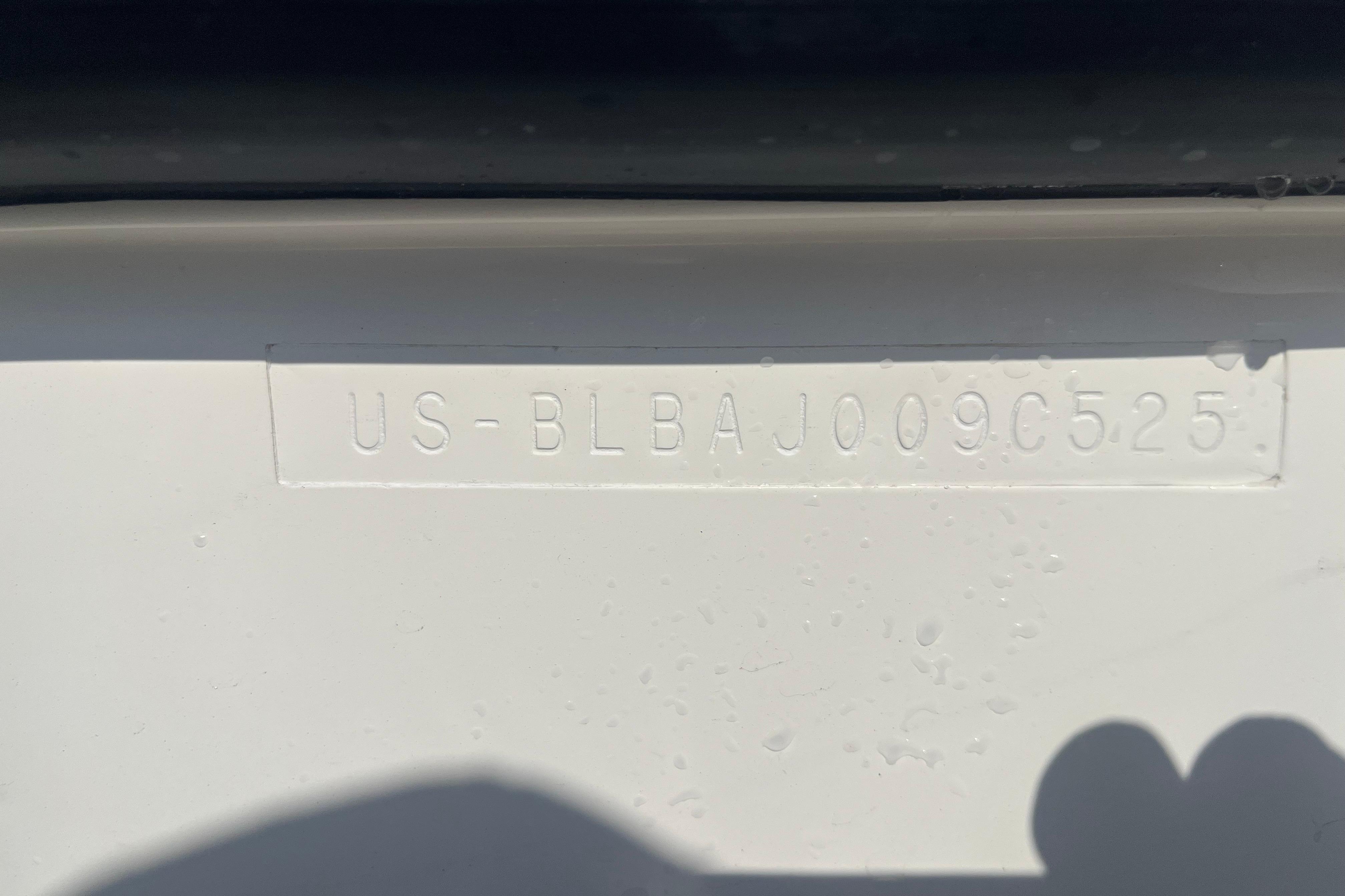 2025 Bayliner Trophy T25 Pilothouse hull identification number (HIN) embossed on white surface.