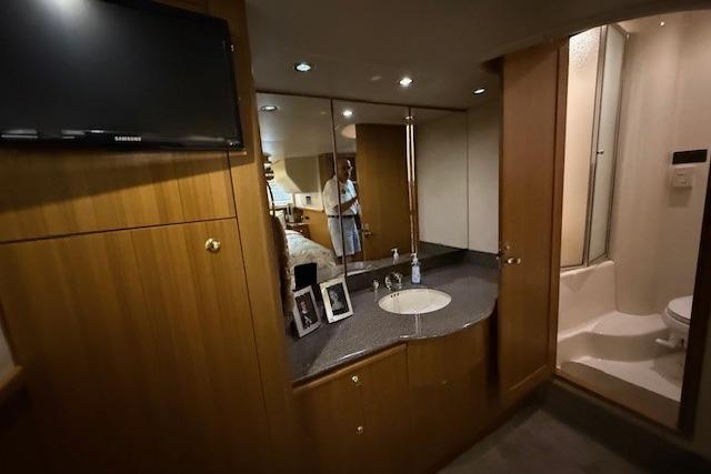 Luxurious bathroom interior of 2001 Bayliner 5288 Pilot House Motoryacht with modern amenities.