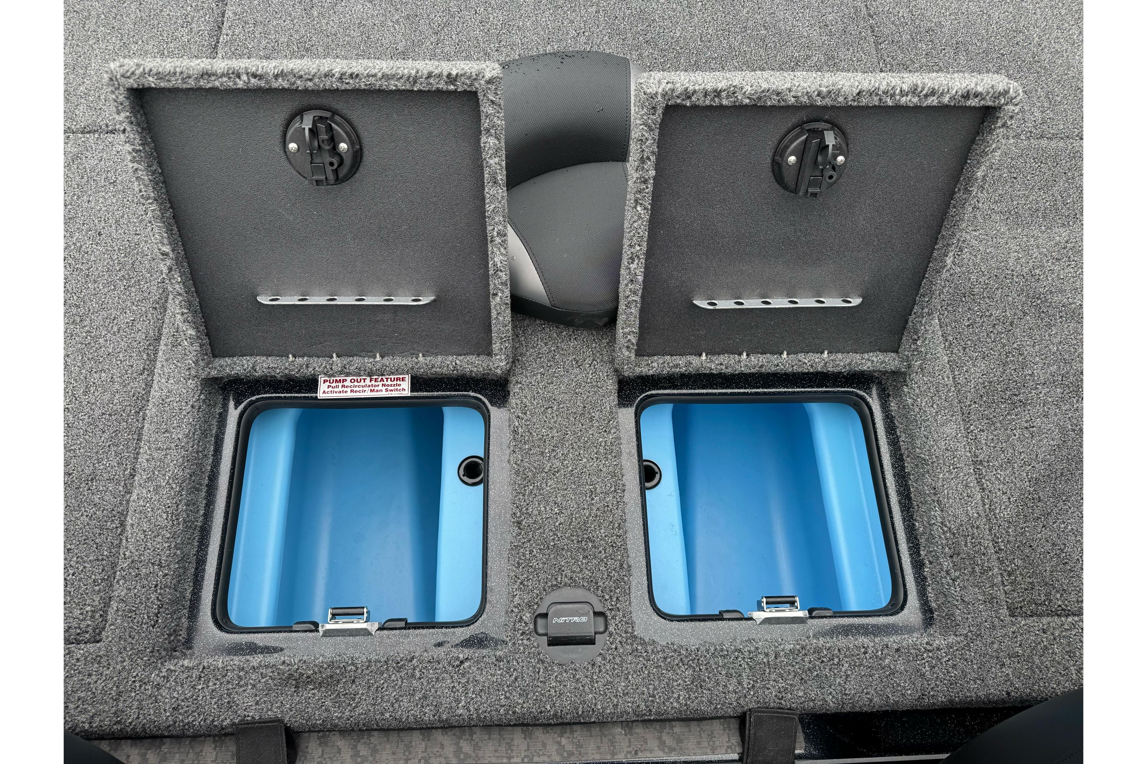 2026 Nitro Z20 XL Pro boat storage compartments with open lids, featuring blue interiors.