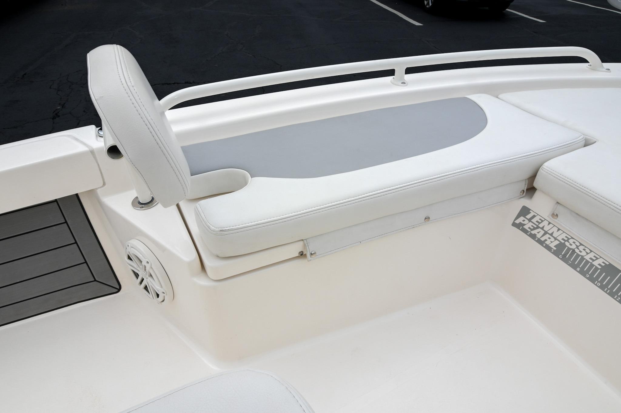 2021 Pathfinder 2200 TRS boat interior with cushioned seating and speaker.