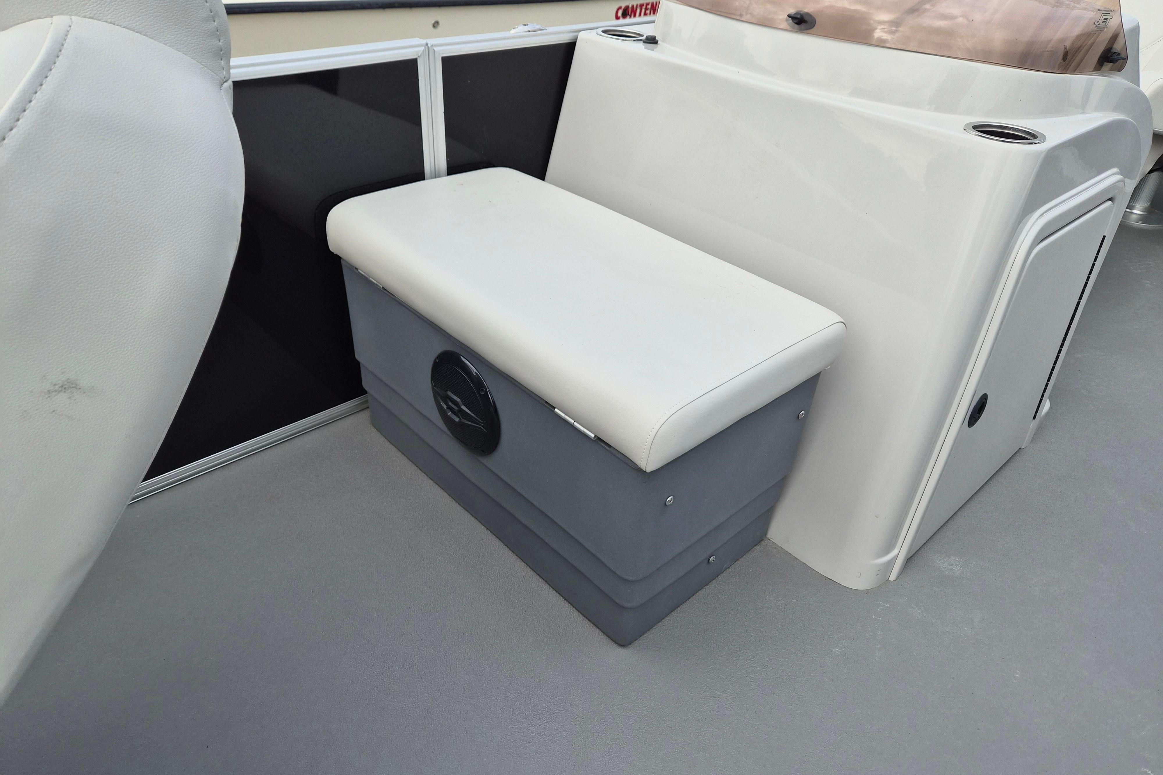 Interior of 2025 Sylvan Mirage Fish 8522 Party Fish 4.0, featuring seating and storage.