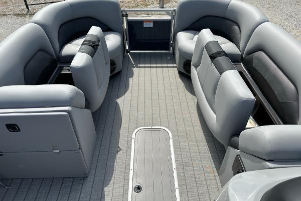 Interior of 2024 Landau ATLANTIS 230C pontoon boat with gray seating.