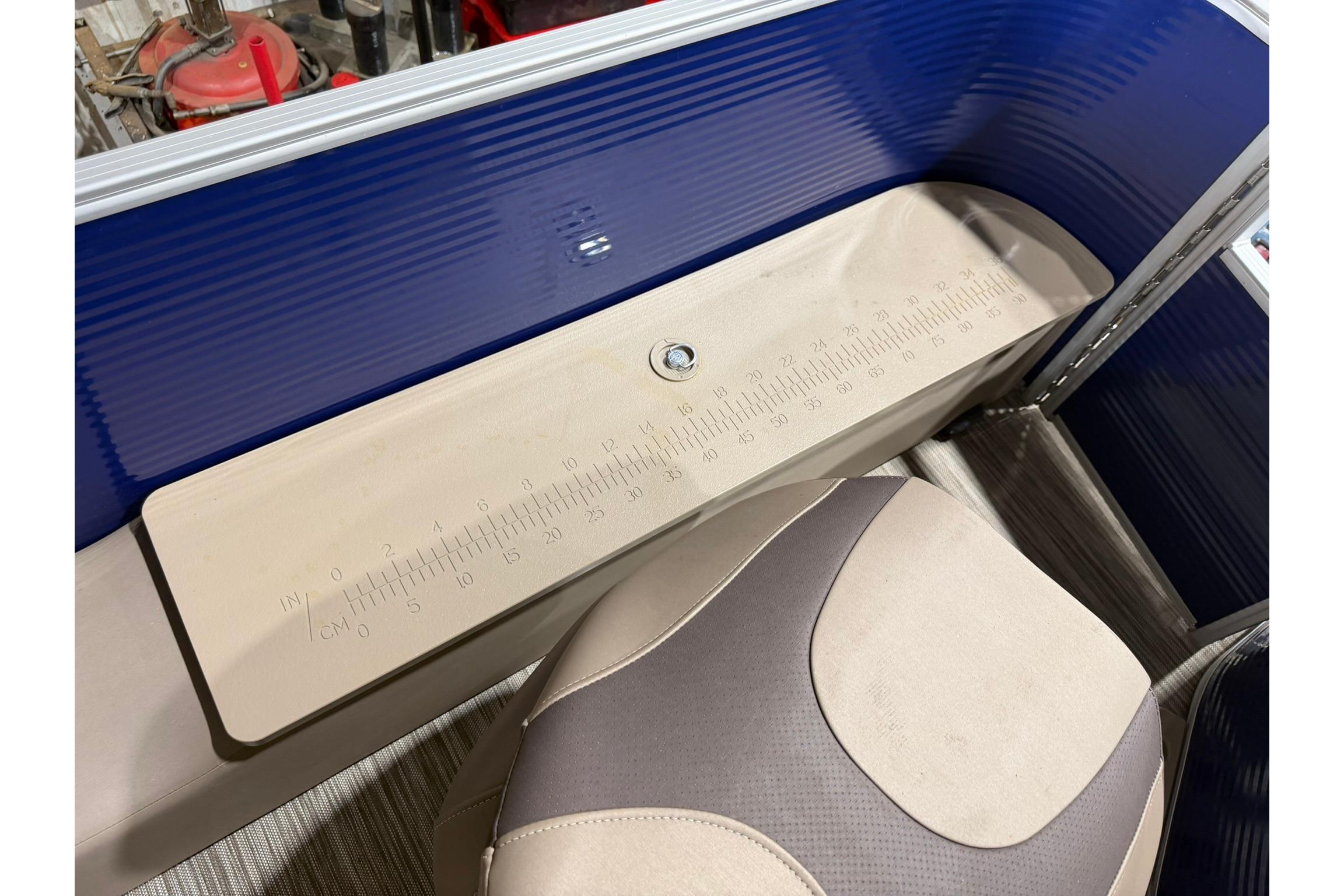 2020 Bennington SX 22 SFX boat interior with measuring board and cushioned seat.