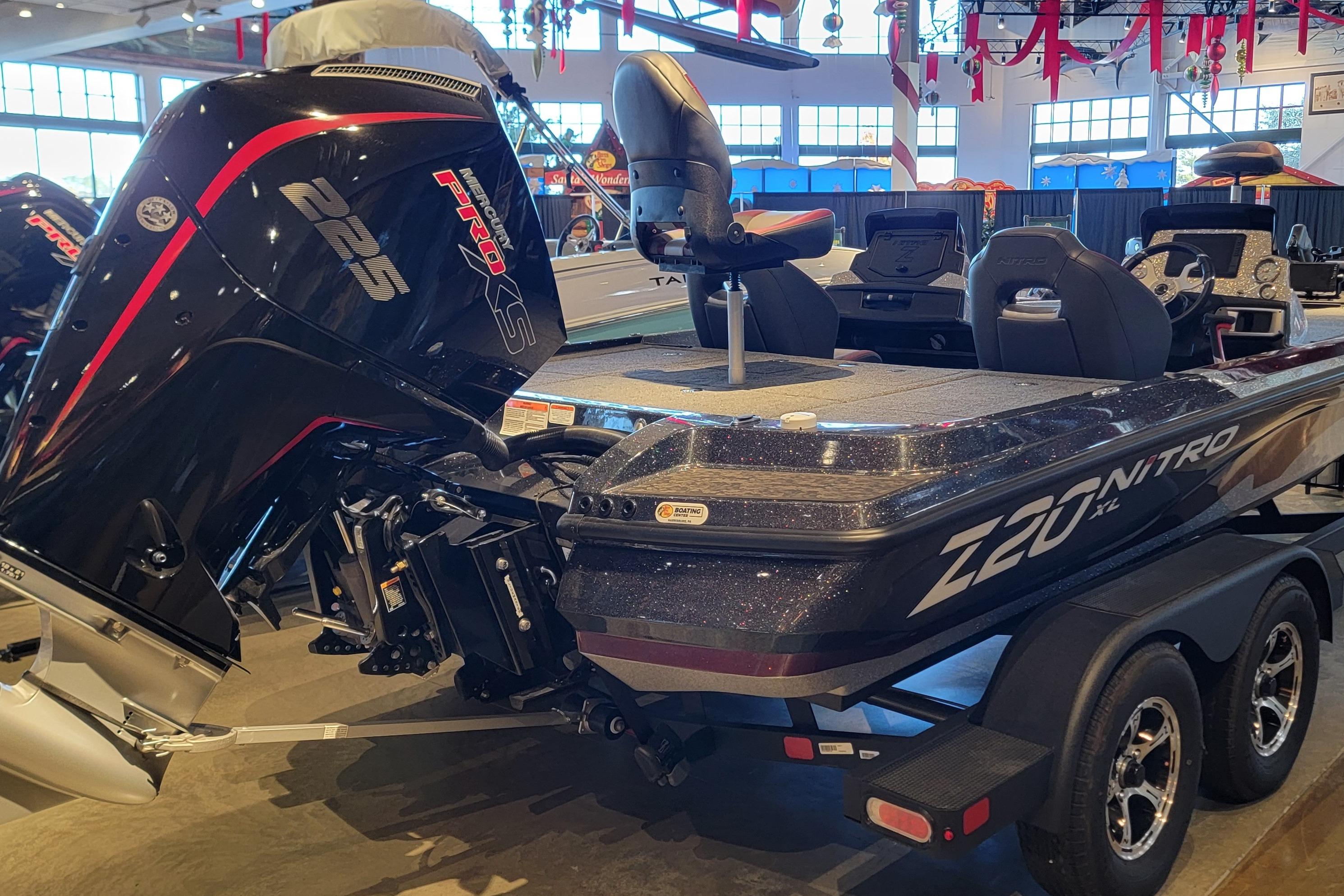 2025 Nitro Z20 XL Pro boat with powerful Mercury 225 Pro XS engine in showroom.