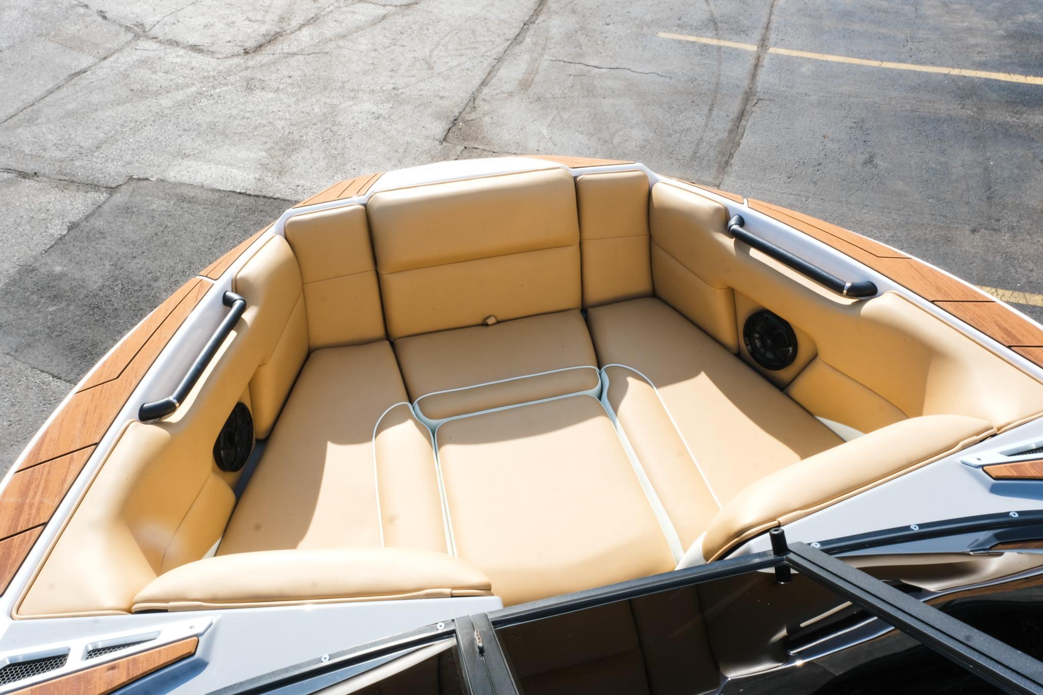 2023 Moomba Mondo boat interior with tan seating and sleek design.
