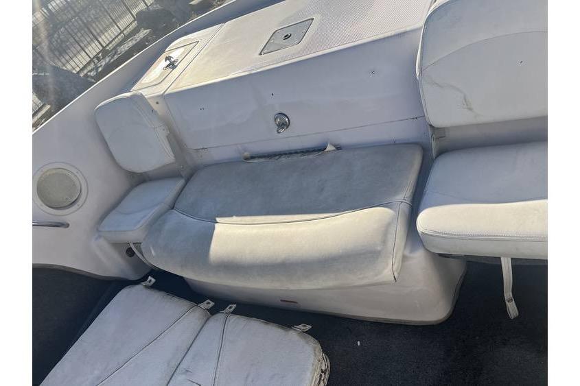 2006 Tahoe 206 boat interior with white seating and storage compartments.