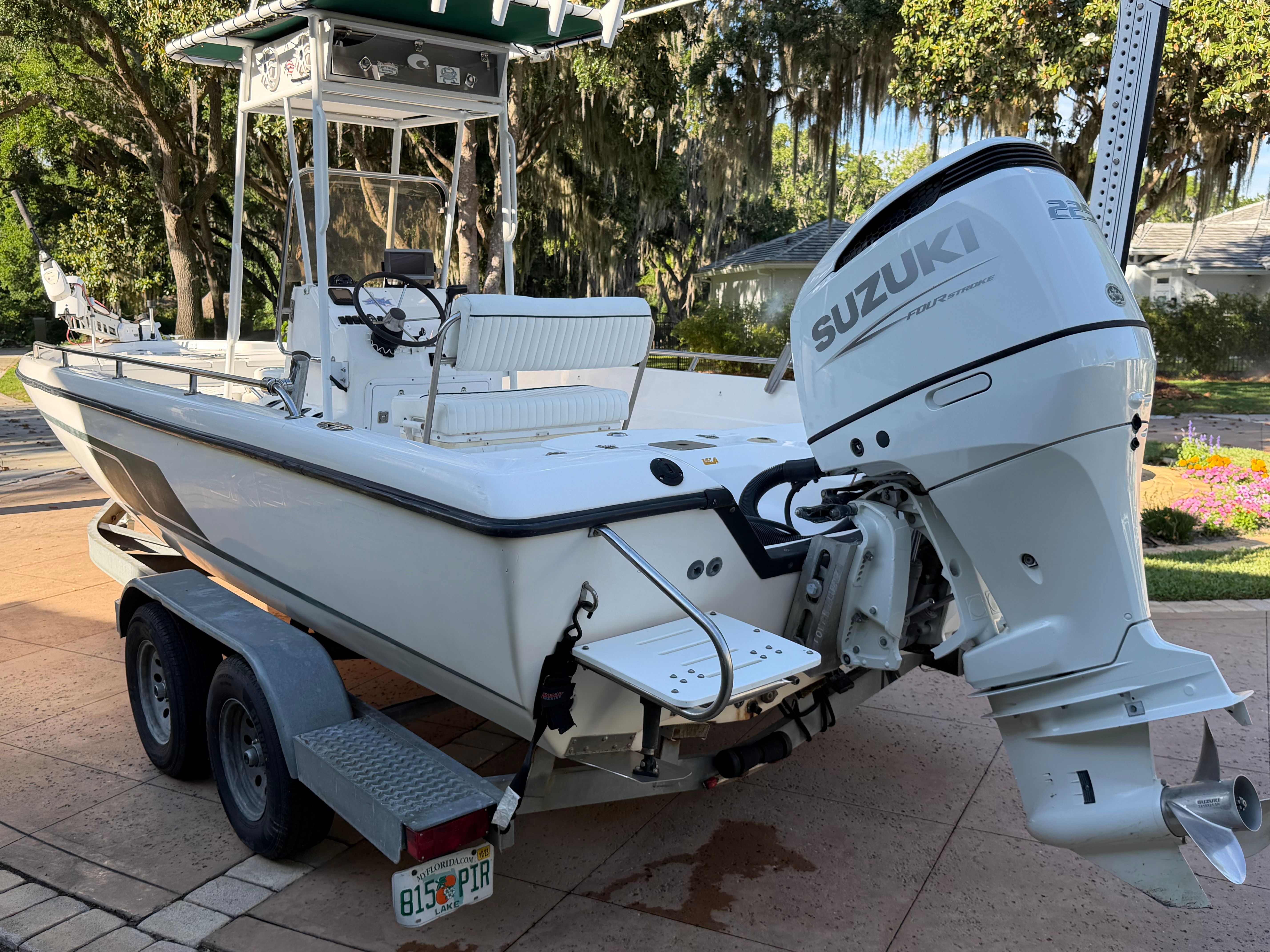 1999 Skeeter ZX2200 boat with Suzuki outboard motor.