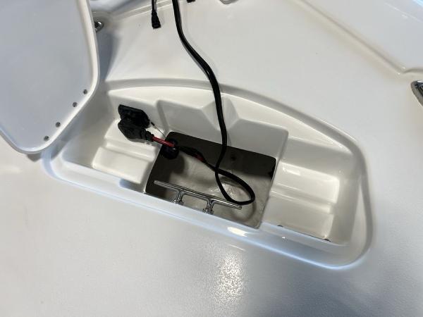 2025 Tidewater 2300 Carolina Bay boat storage compartment with wiring.
