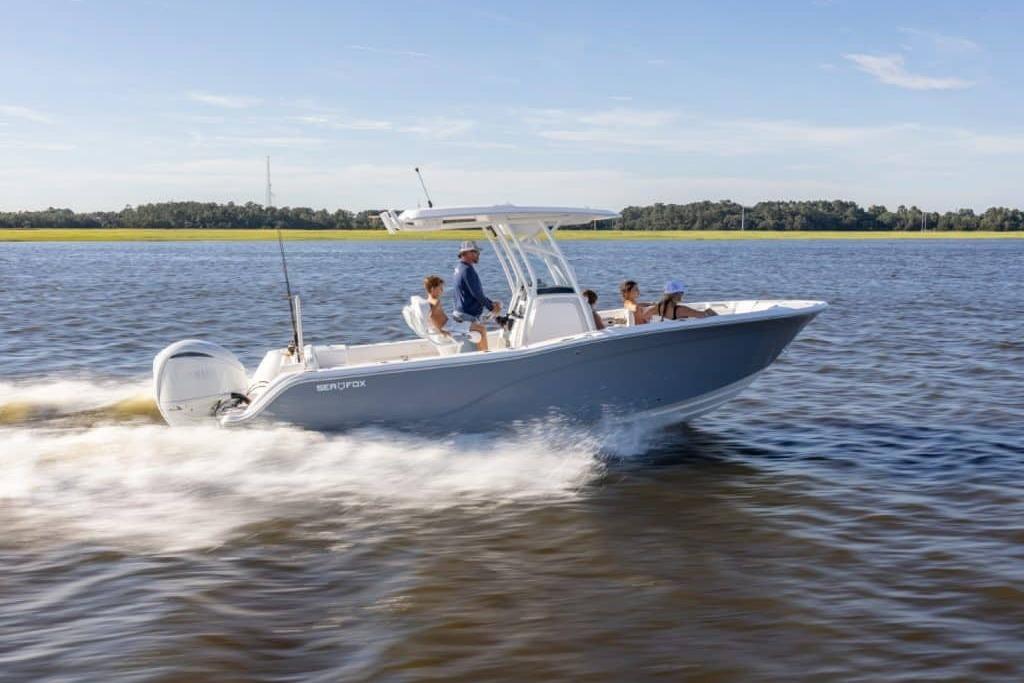 2027 Sea Fox 248 Commander cruising on a sunny day with passengers onboard.