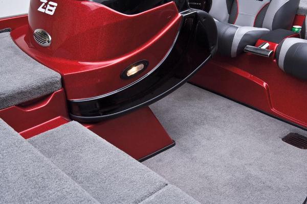 Manufacturer Provided Image: Red Nitro Z-8 boat interior, 2013 model, featuring carpeted flooring and seating.