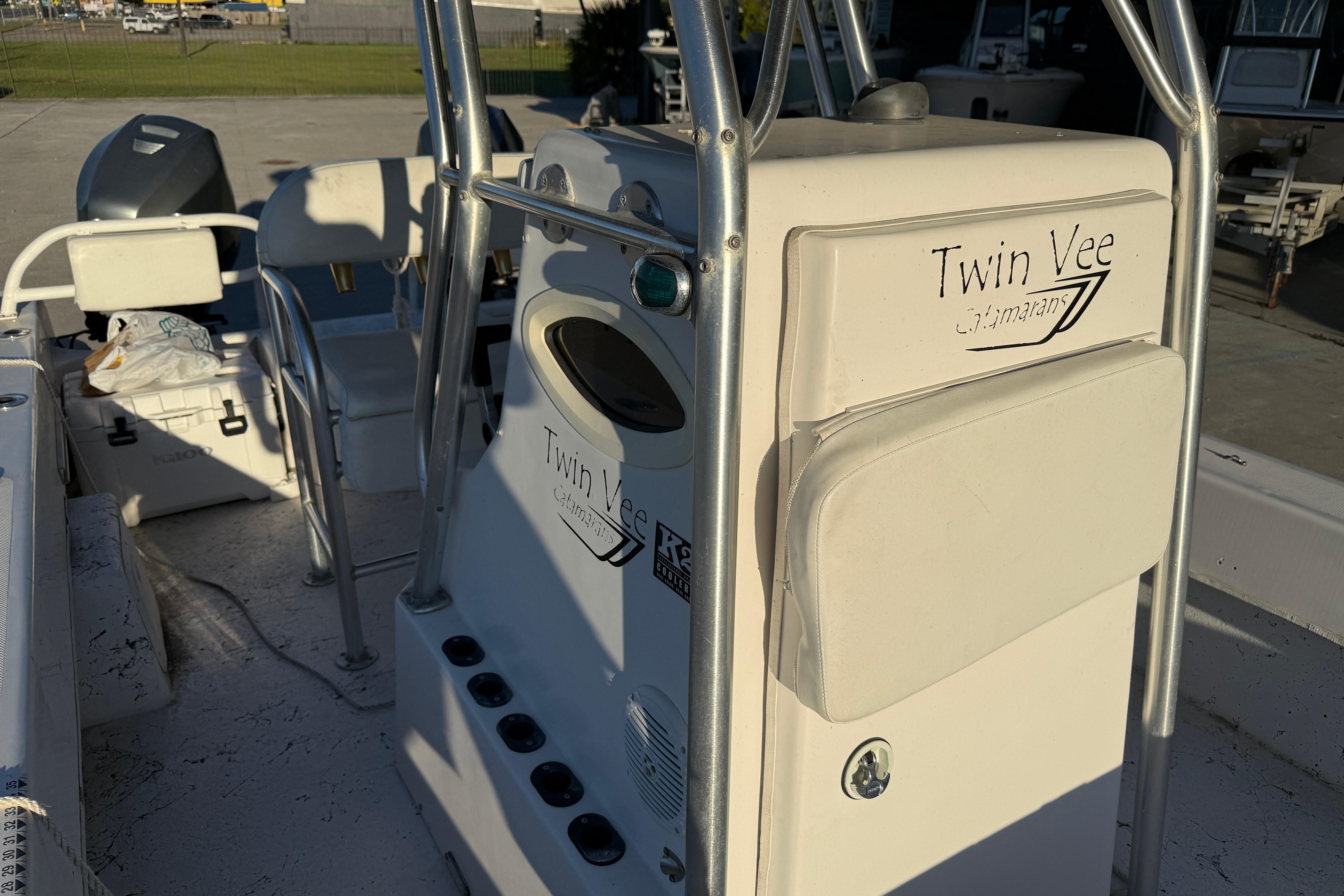 2007 Twin Vee 26 Center Console boat interior with steering console and seating.
