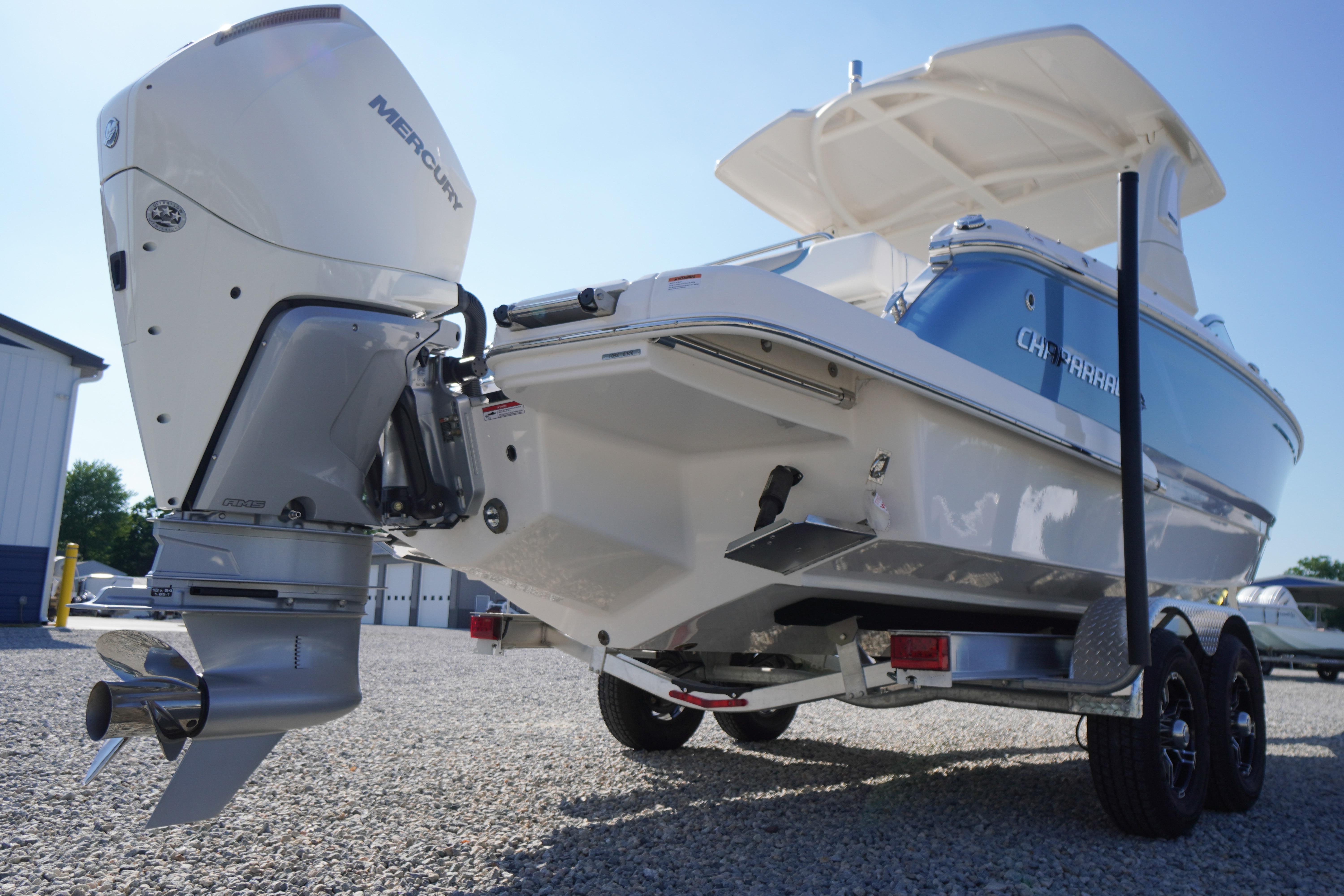 2026 Chaparral 270 OSX boat with Mercury outboard engine on trailer.