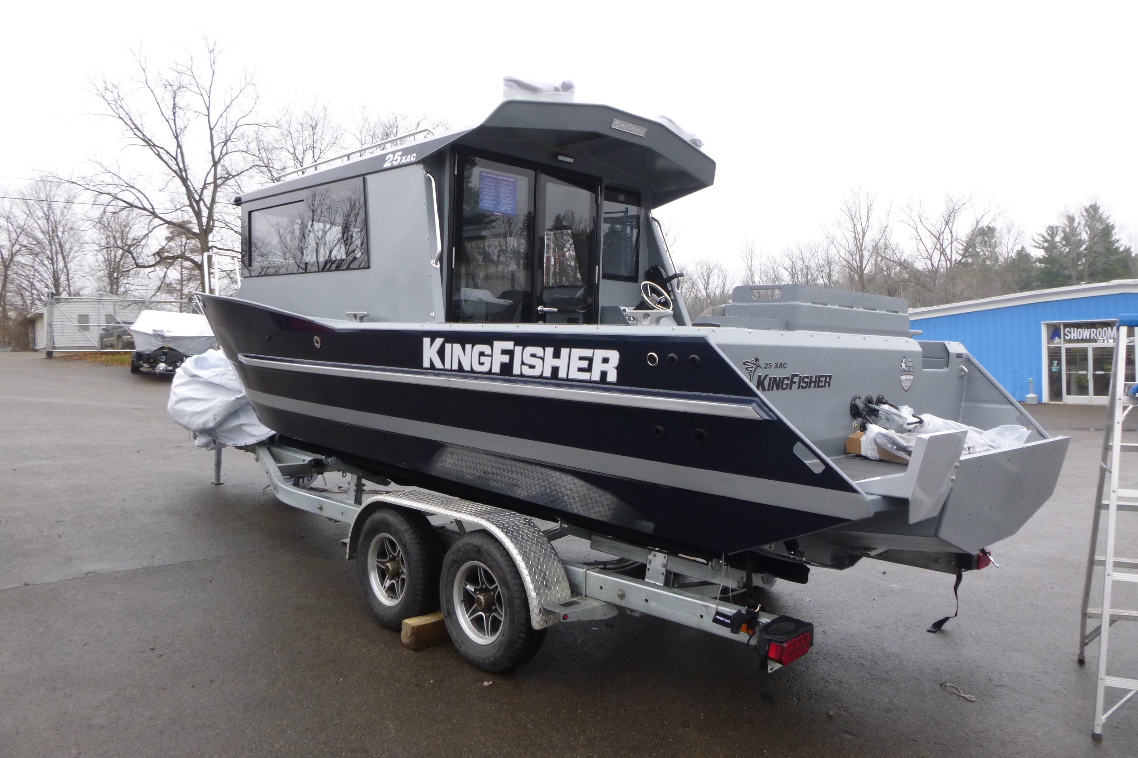 2026 KingFisher 25 XAC boat on trailer, parked outdoors.