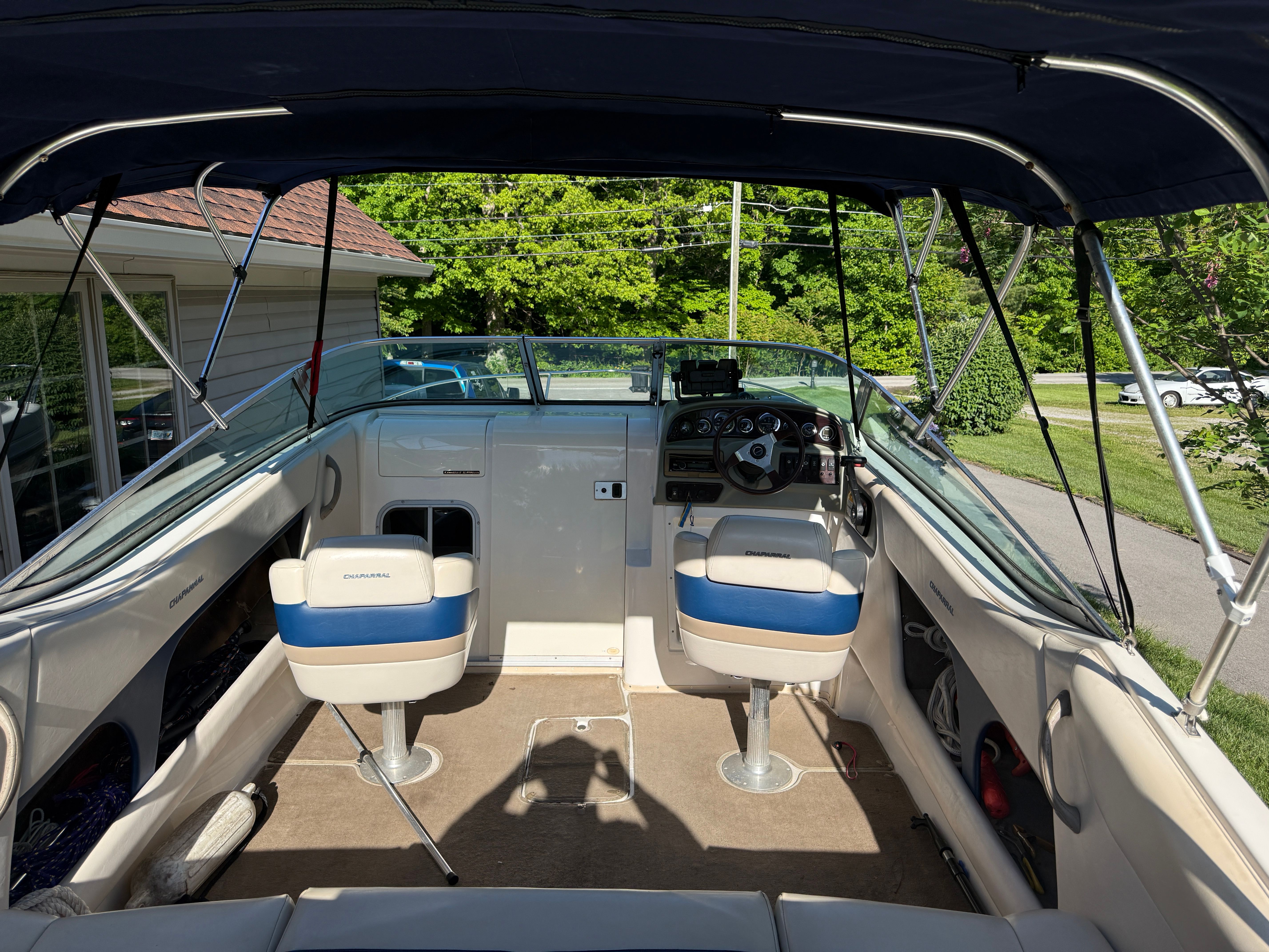 Interior view of a 1999 Custom 2335 Cuddy Cabin boat.
