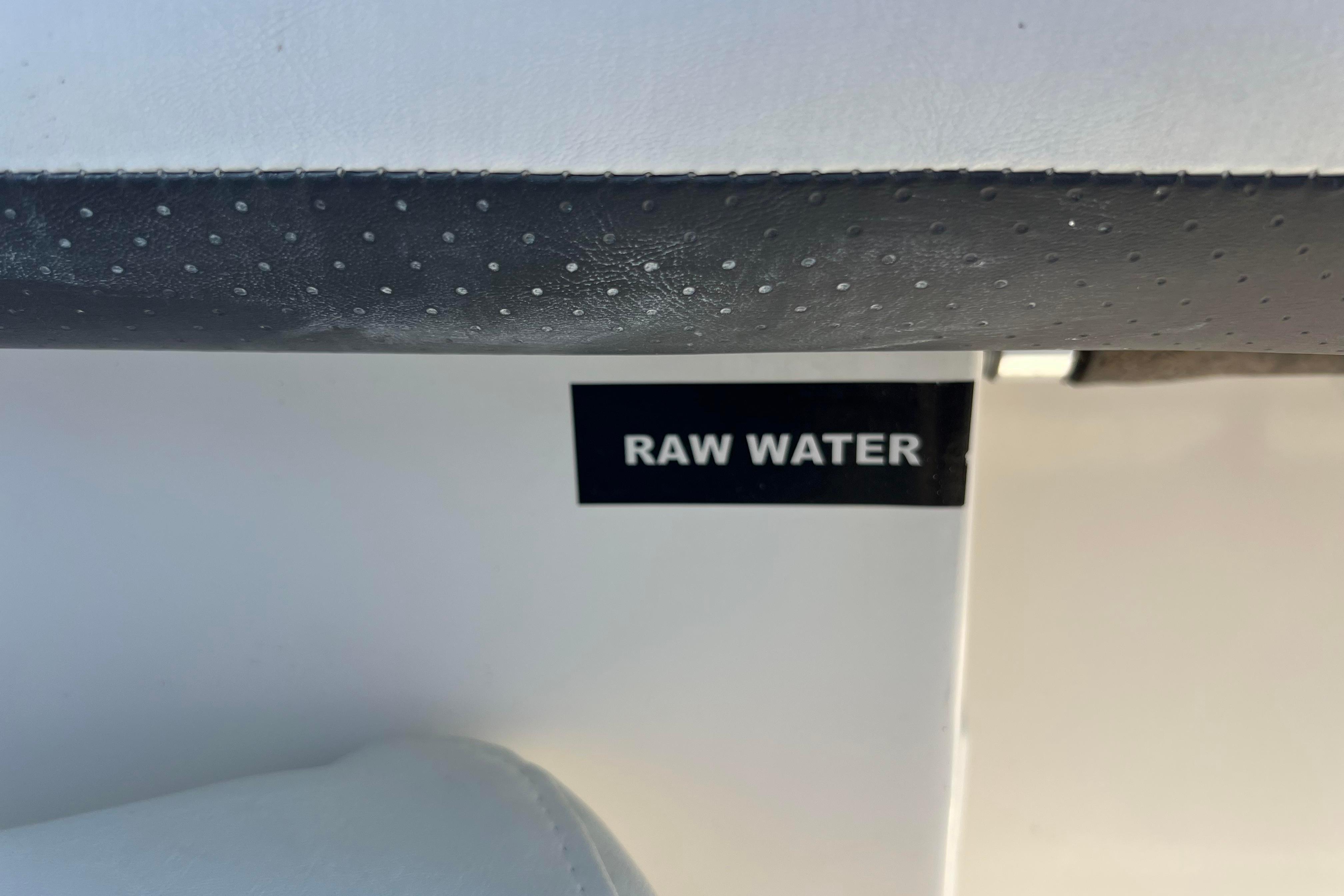 Raw water label on 2012 Sea Fox 206 Center Console boat interior.